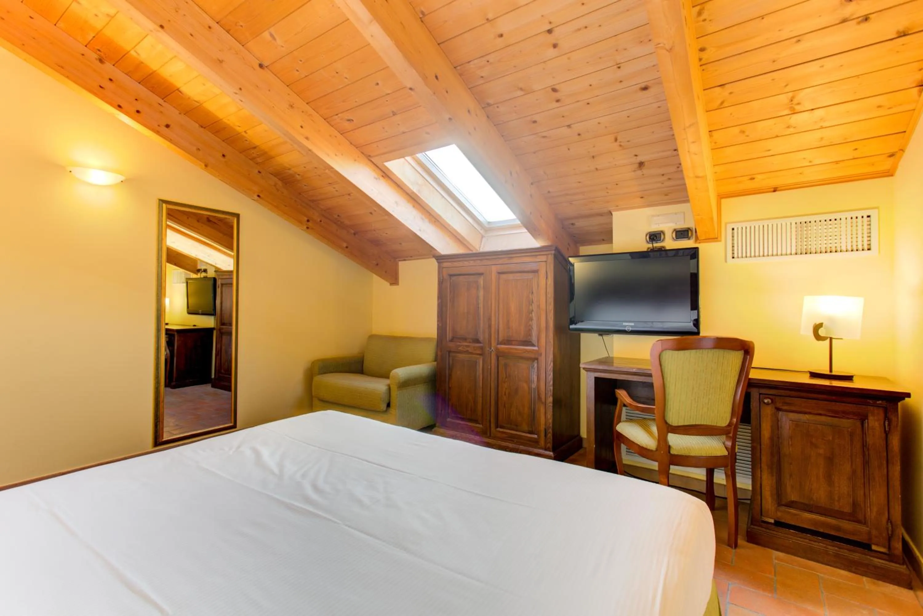 Bedroom, Bed in Oste del Castello Wellness & Bike Hotel