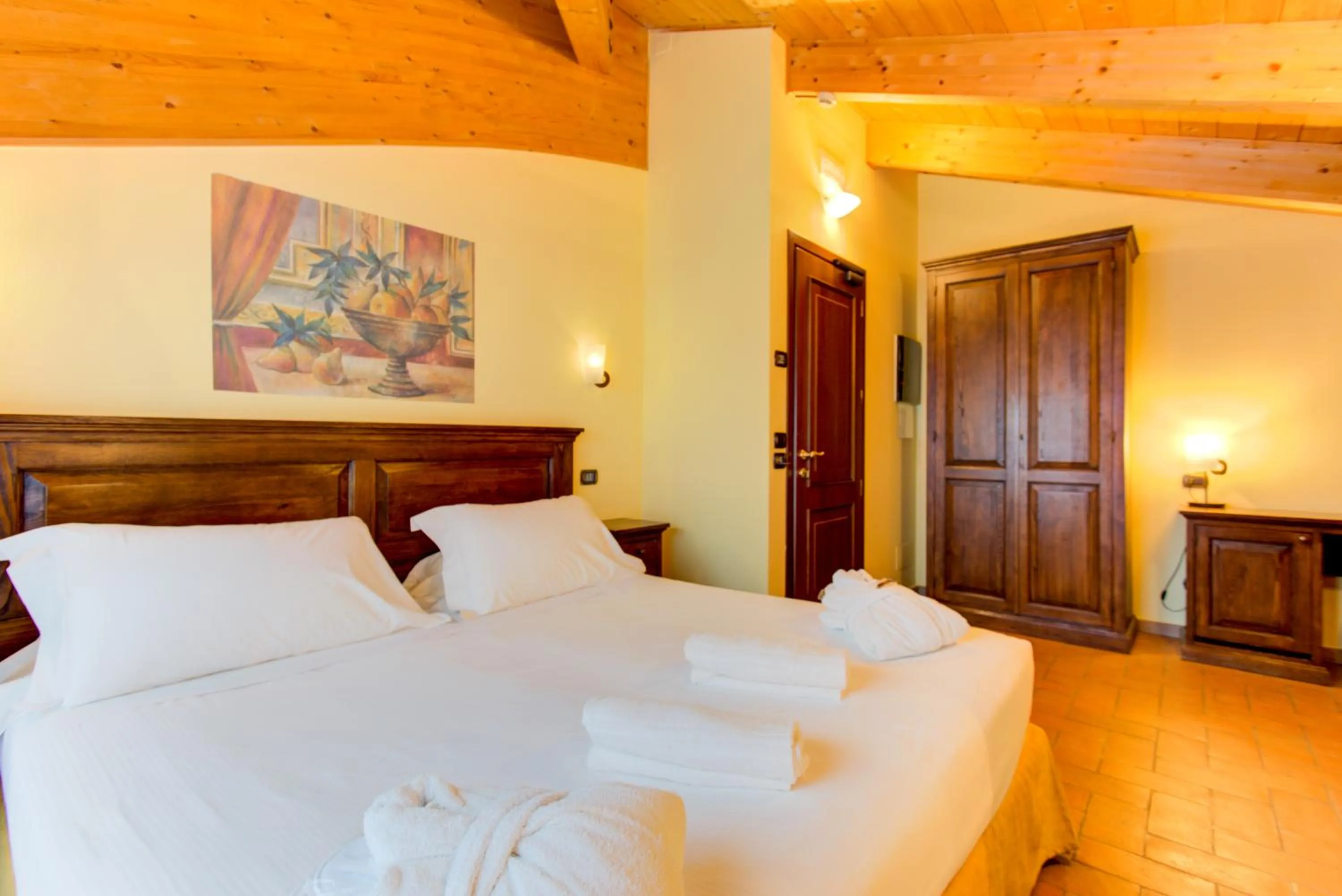 Bedroom, Bed in Oste del Castello Wellness & Bike Hotel
