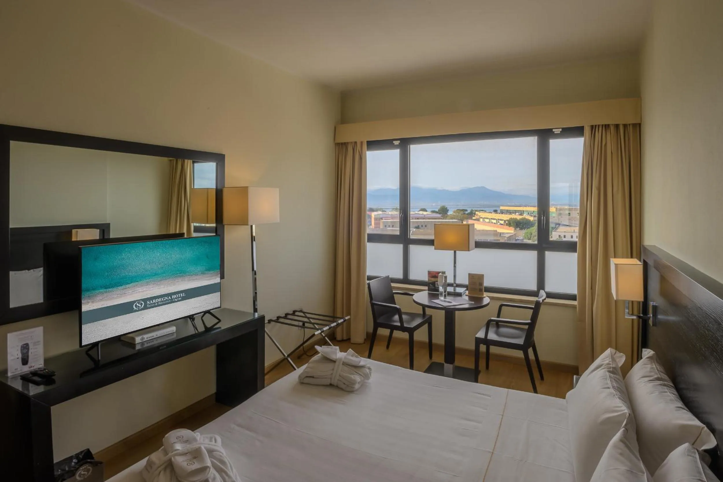 TV and multimedia, Bed in Sardegna Hotel - Suites & Restaurant