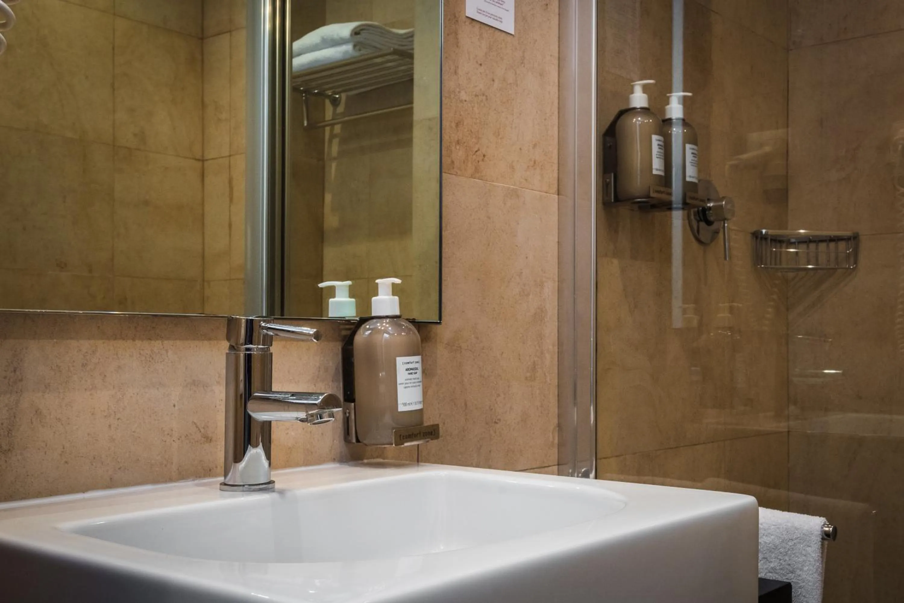 Bathroom in Sardegna Hotel - Suites & Restaurant