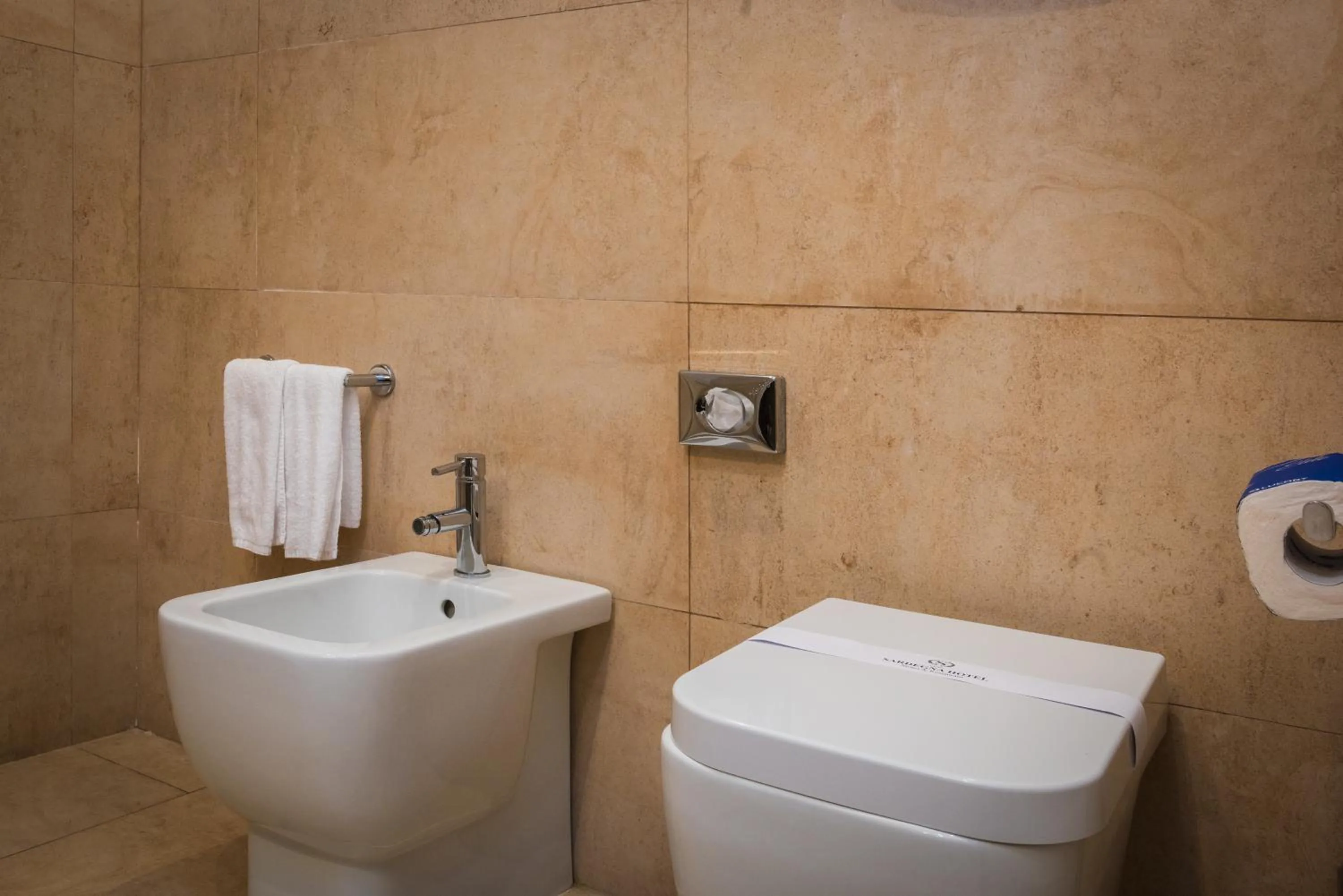 Bathroom in Sardegna Hotel - Suites & Restaurant