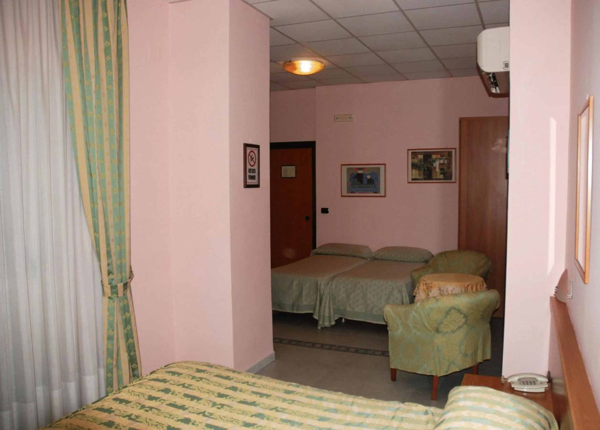 Quadruple Room in Hotel Grillo Verde