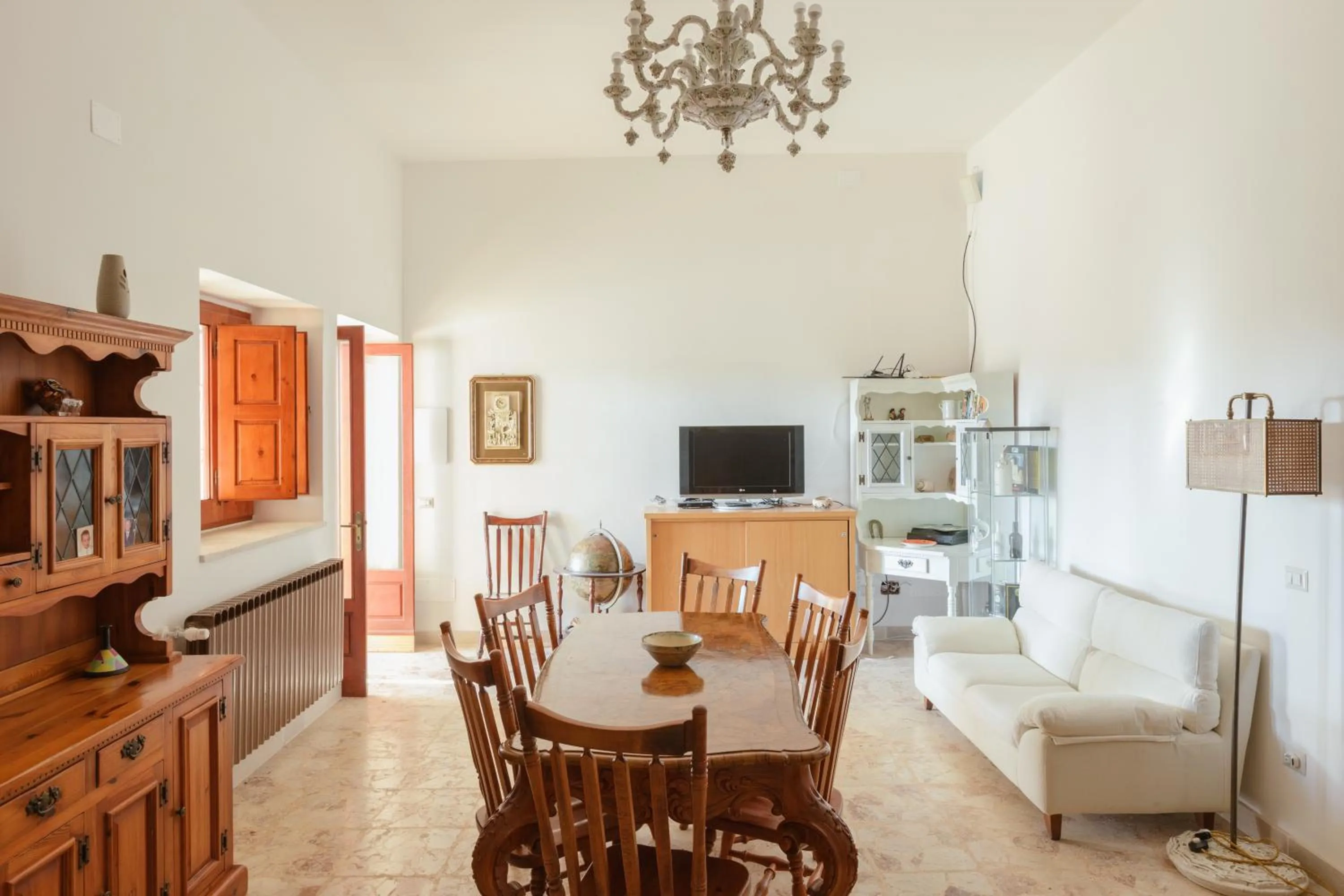 Communal lounge/ TV room in Casolare Lodedo