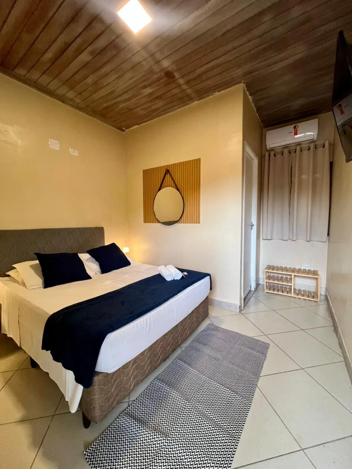 Bed in Pousada Casa Rosada Ilhabela