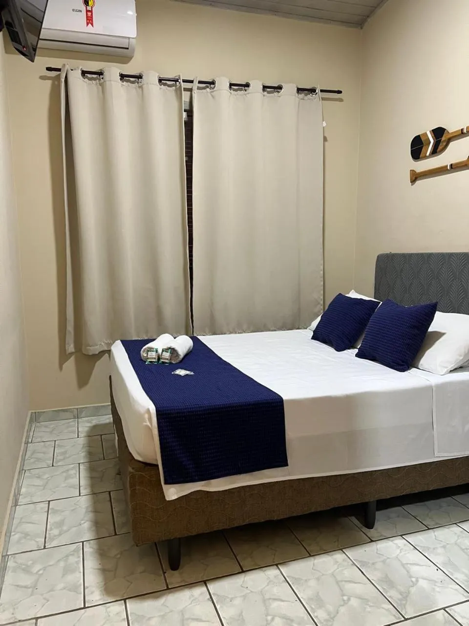 Bed in Pousada Casa Rosada Ilhabela