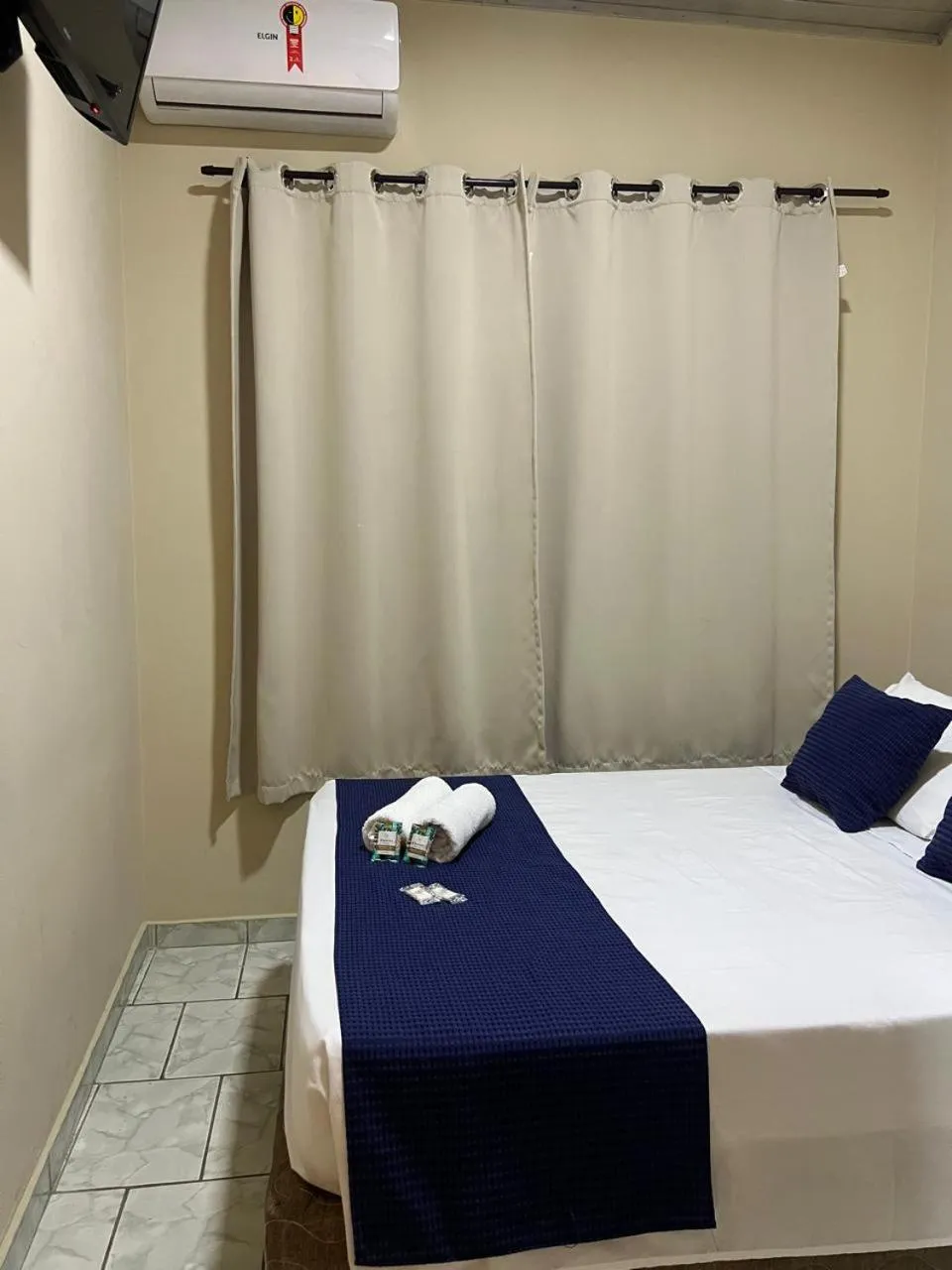 Bed in Pousada Casa Rosada Ilhabela