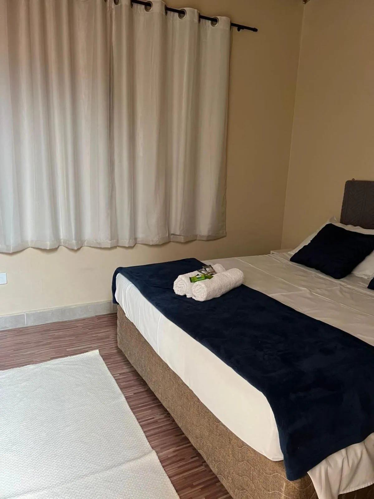 Bed in Pousada Casa Rosada Ilhabela