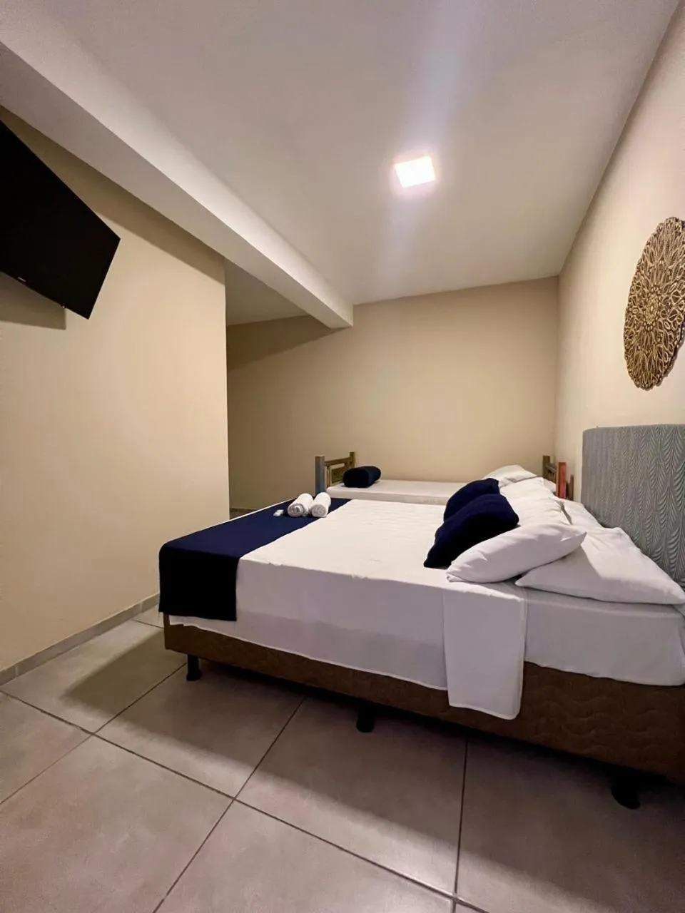 Bed in Pousada Casa Rosada Ilhabela