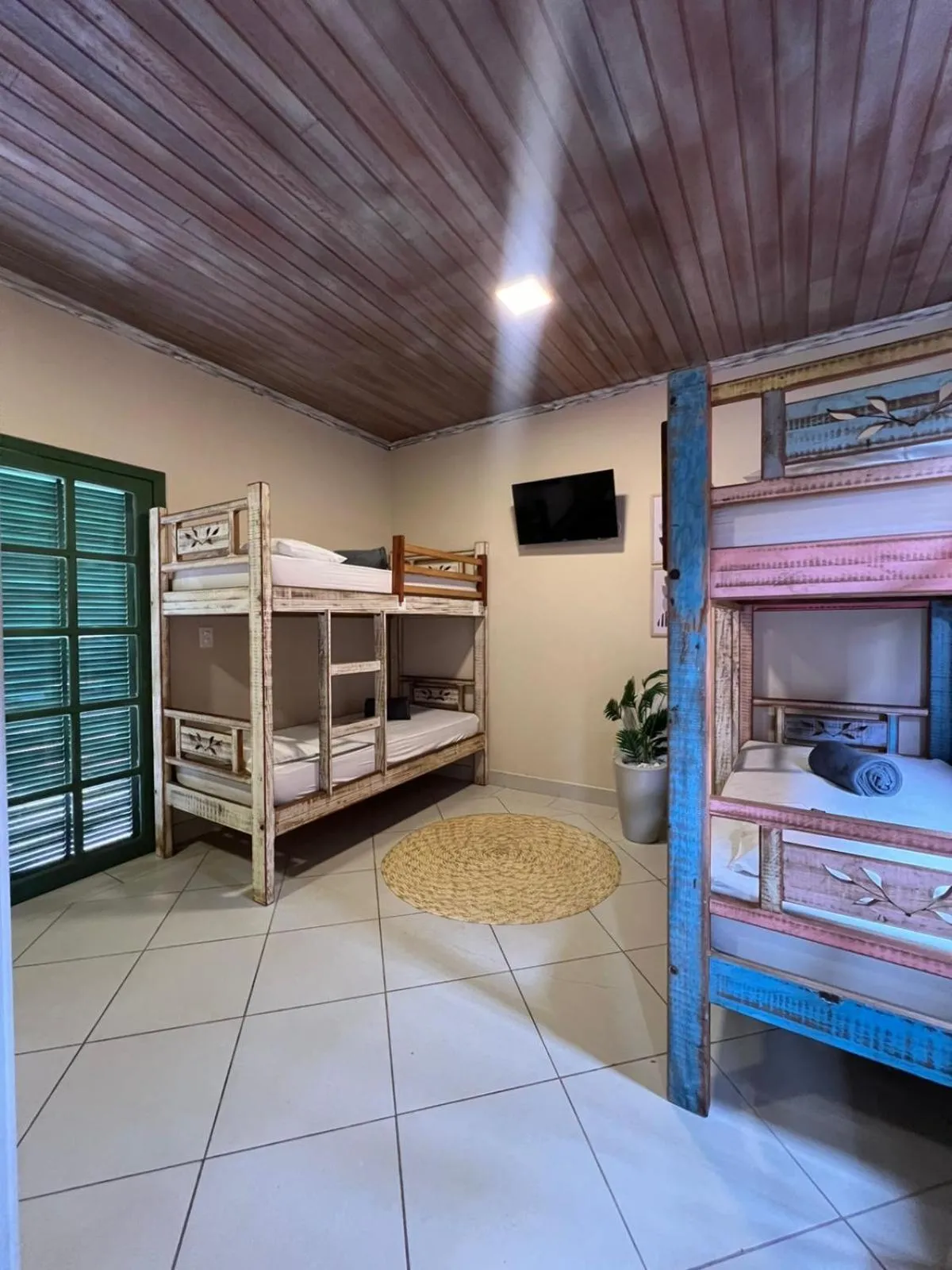 Bed in Pousada Casa Rosada Ilhabela