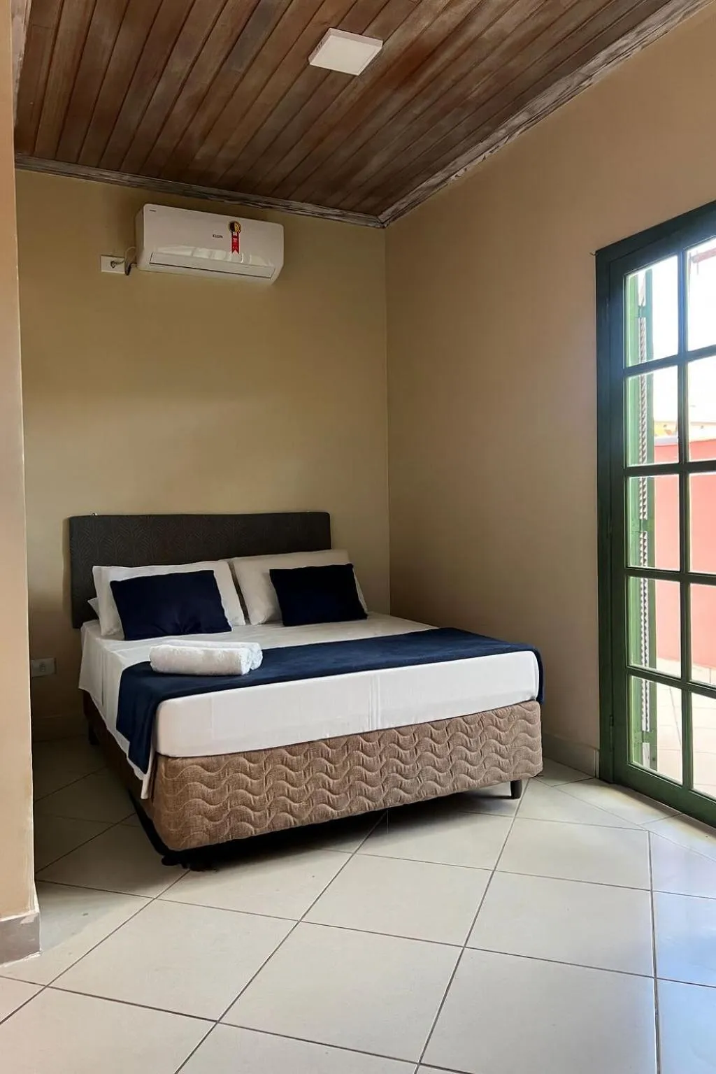 Bed in Pousada Casa Rosada Ilhabela