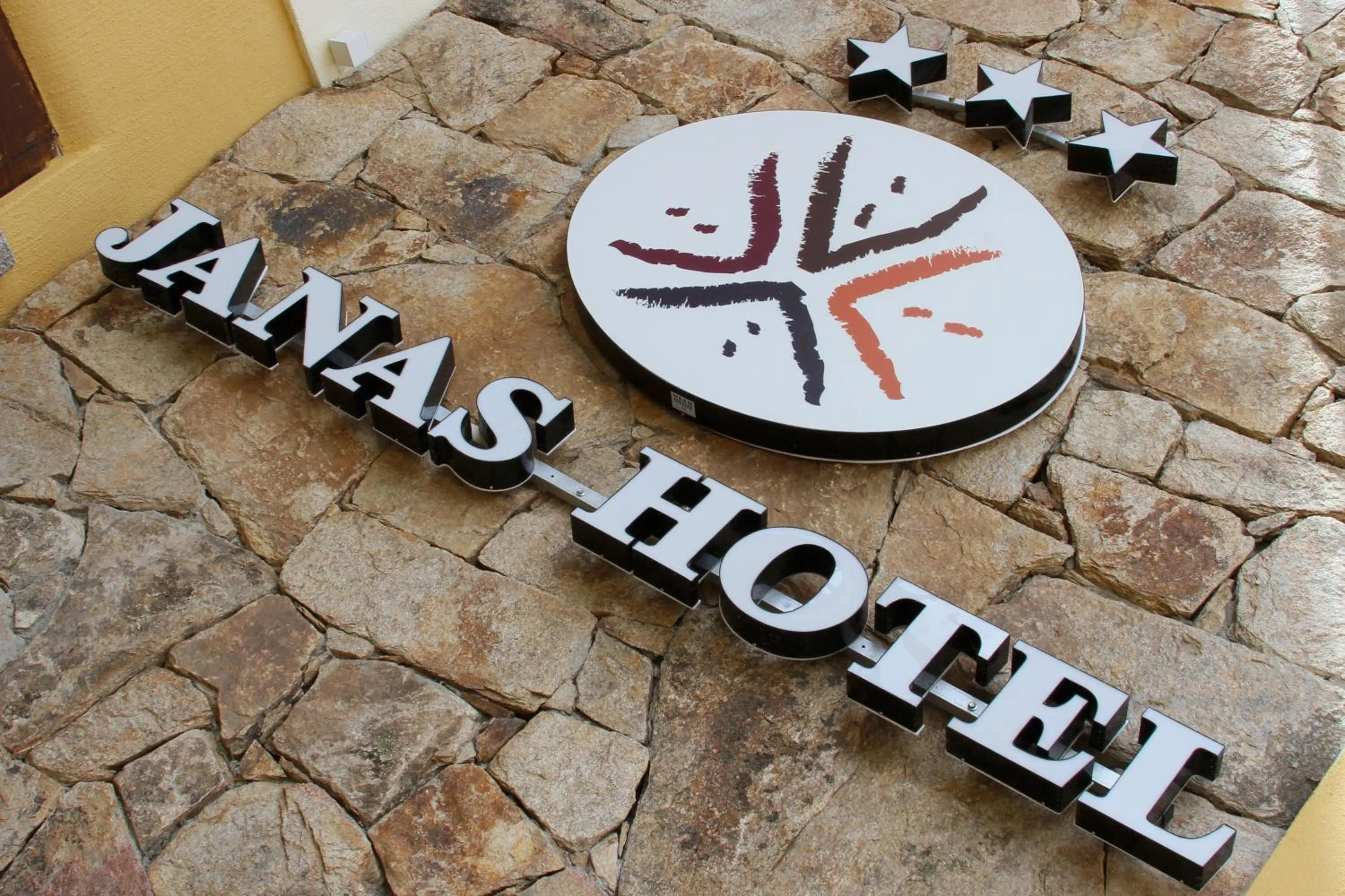 Property logo or sign in Janas Hotel
