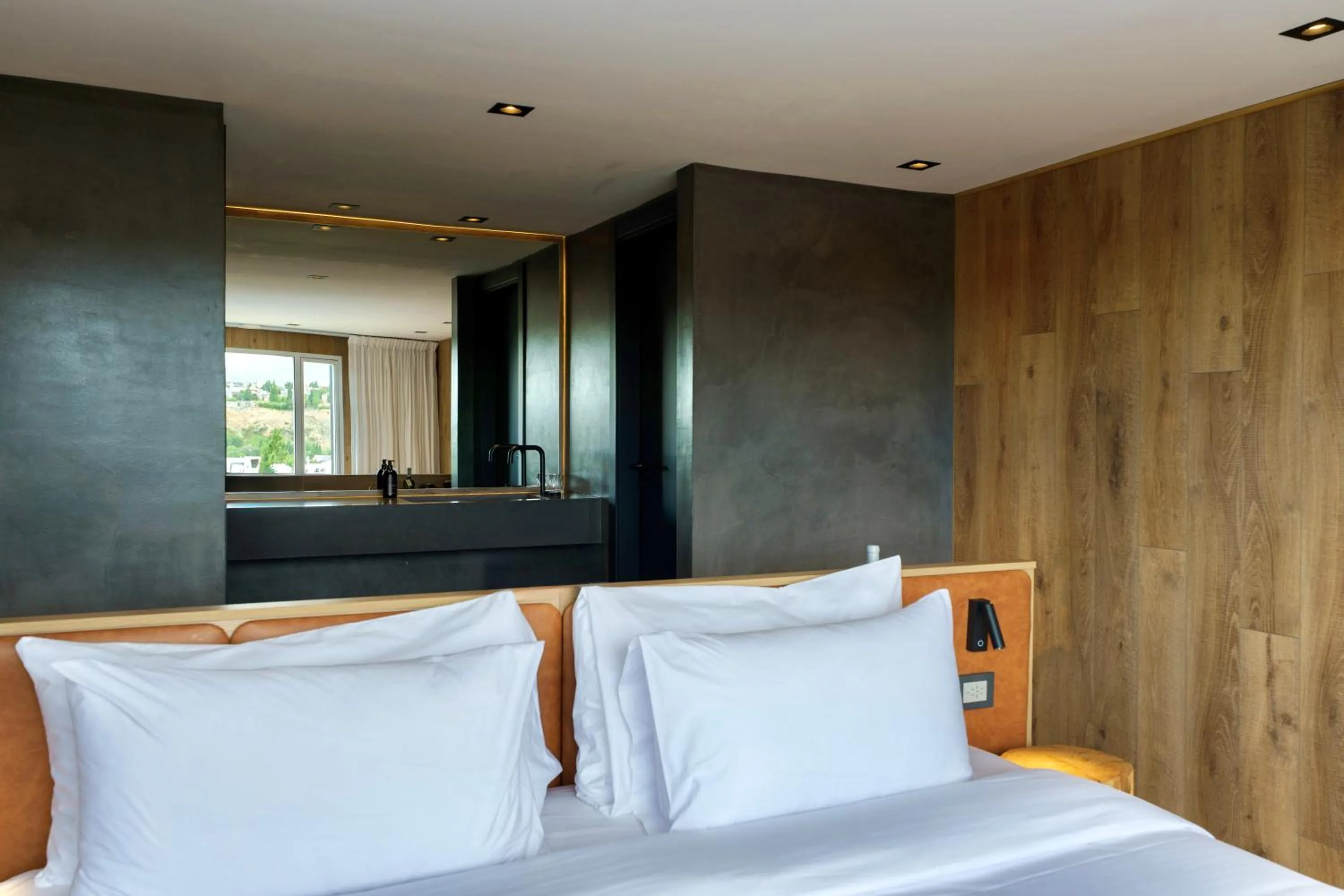 Bed in Montano Boutique Suites