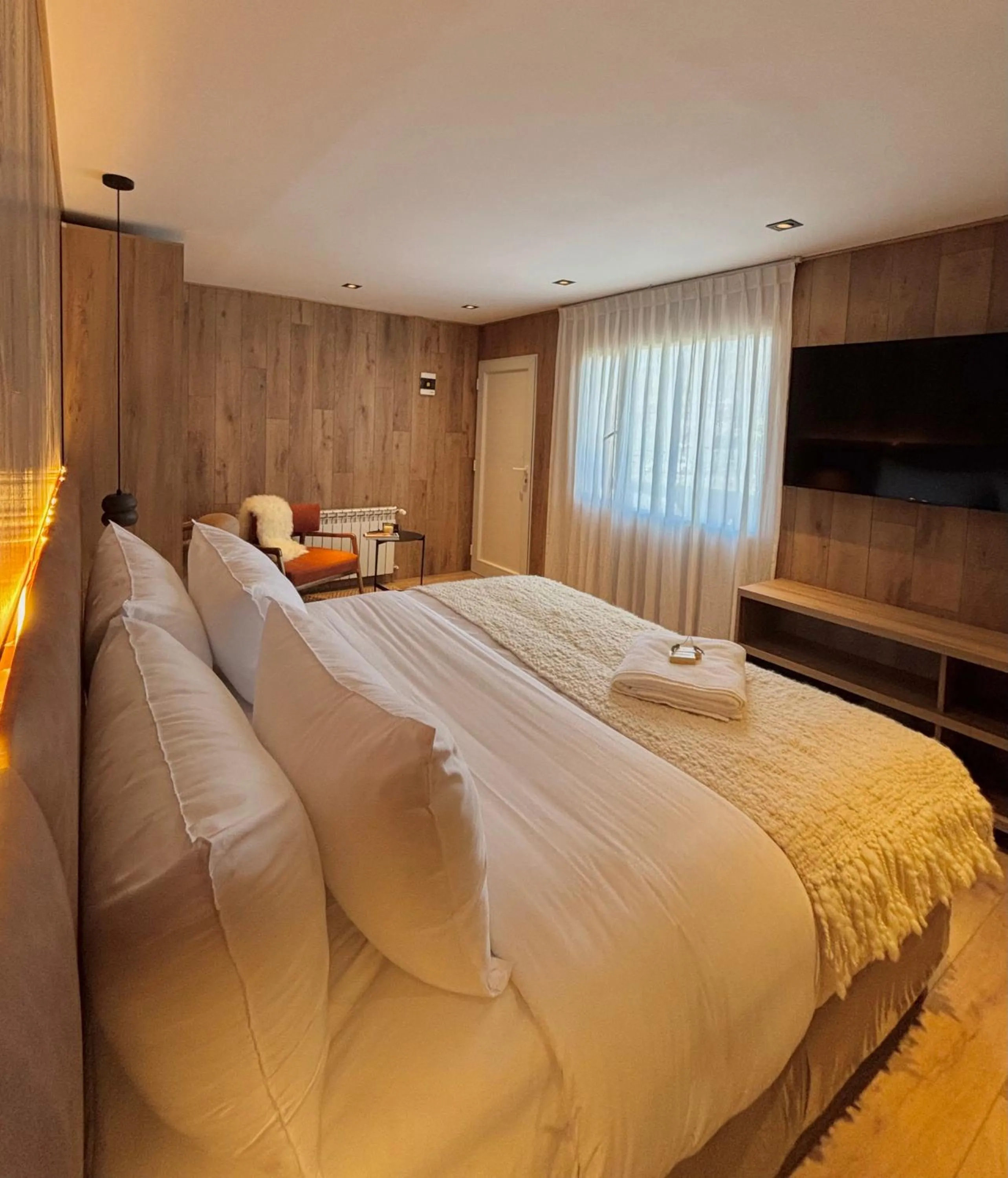 Bed in Montano Boutique Suites