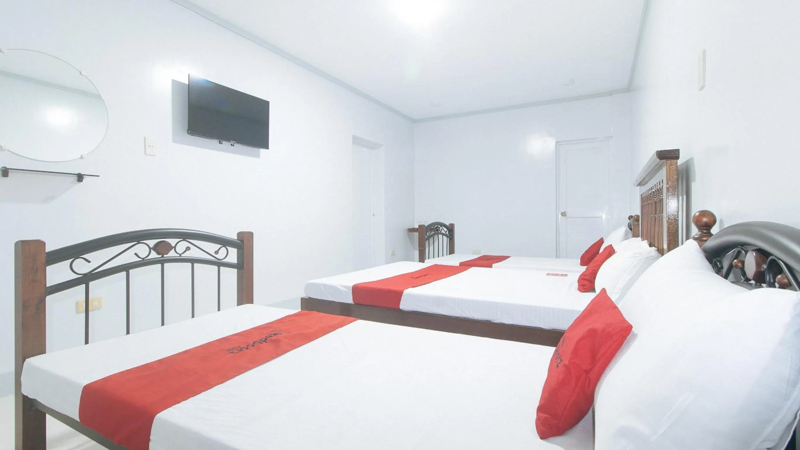 Bed in RedDoorz at Guimod Transient House Ilocos Sur