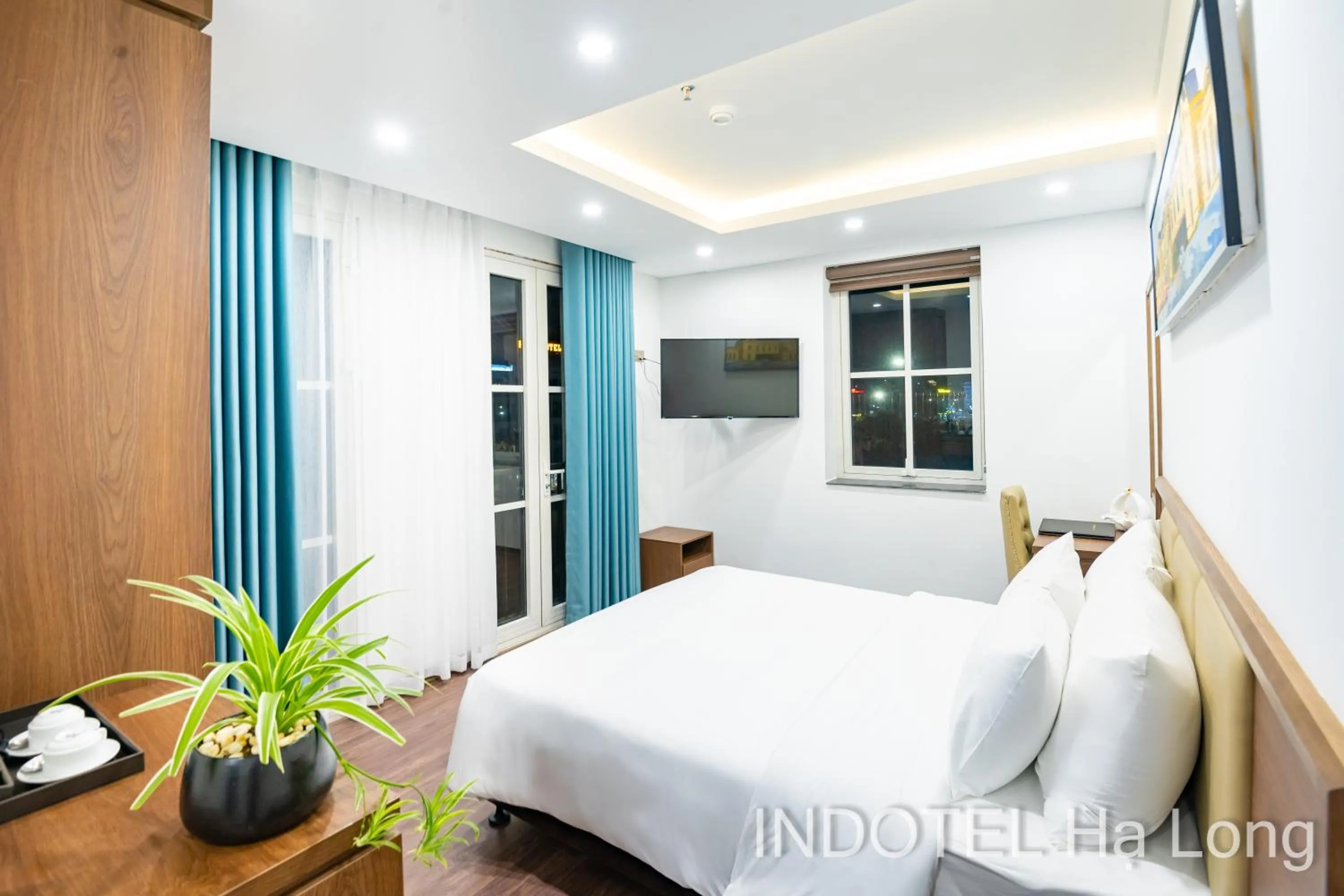 Bed in INDOTEL HALONG HOTEL