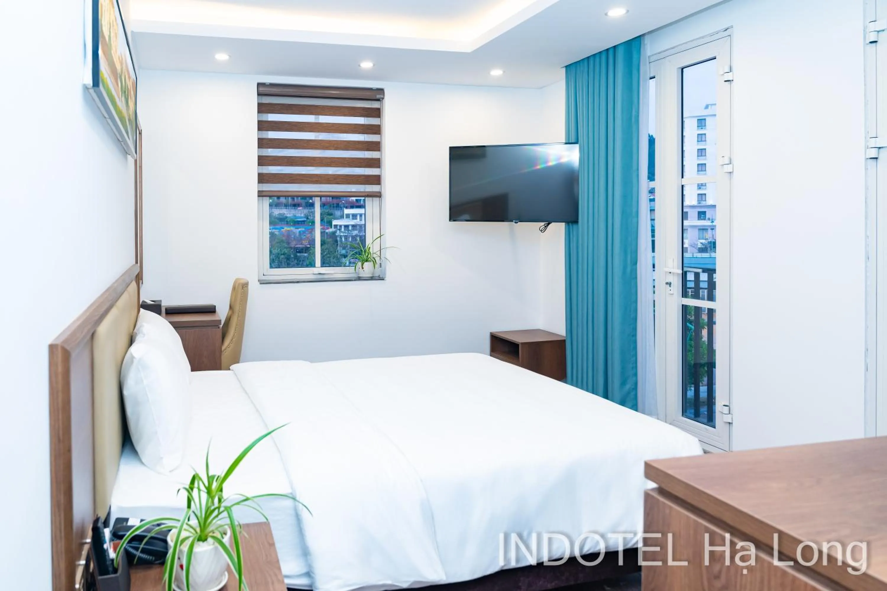 Bed in INDOTEL HALONG HOTEL