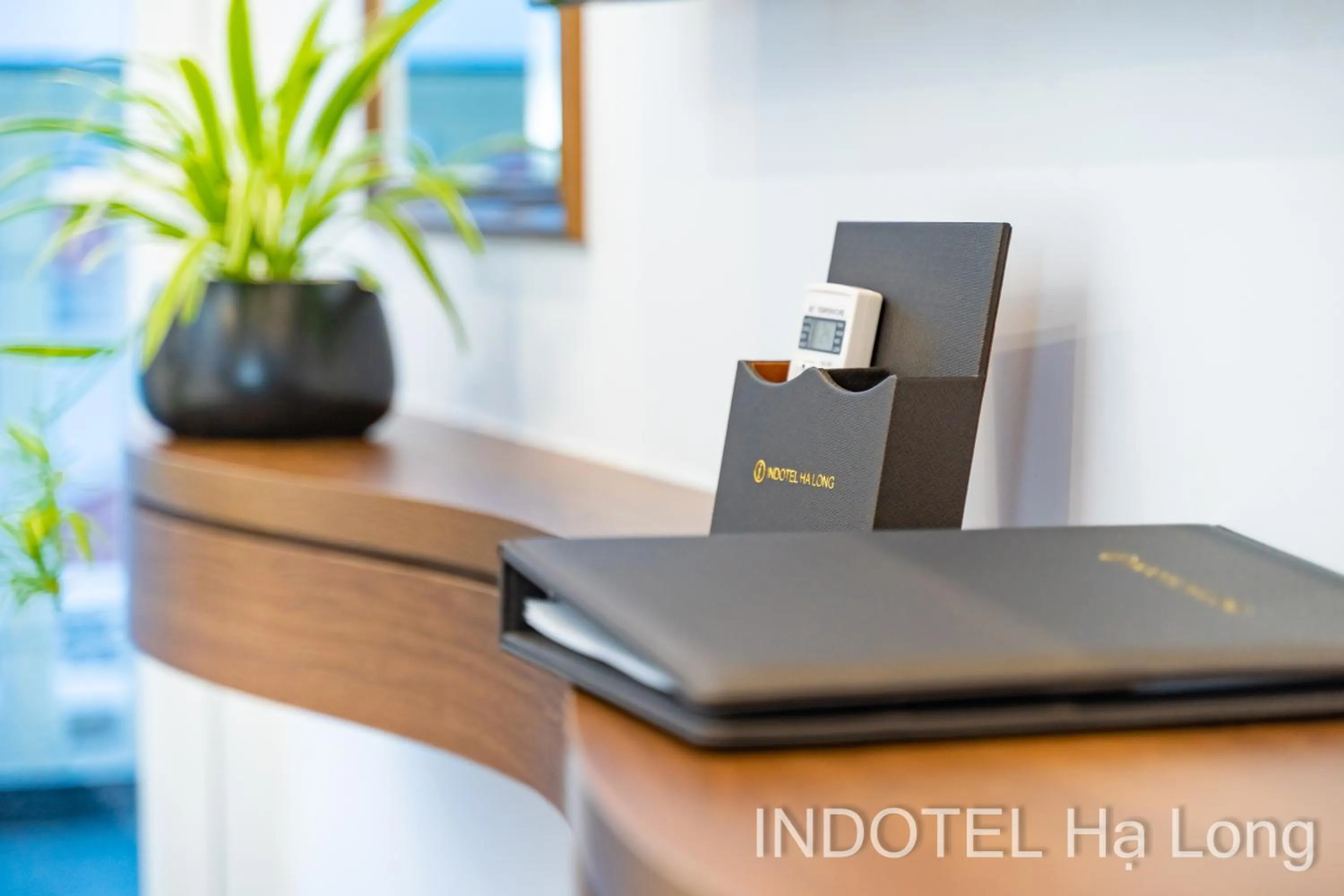 Text overlay in INDOTEL HALONG HOTEL