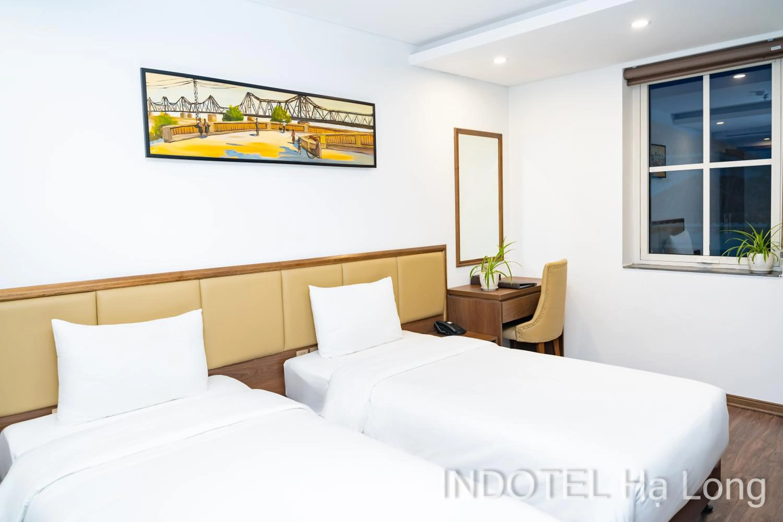 Bed in INDOTEL HALONG HOTEL