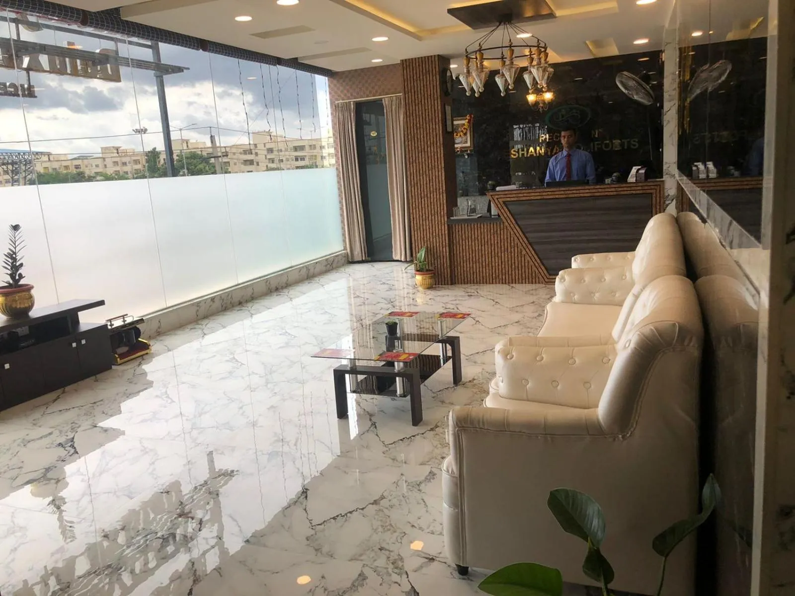 Lobby or reception in Eshanya Comforts