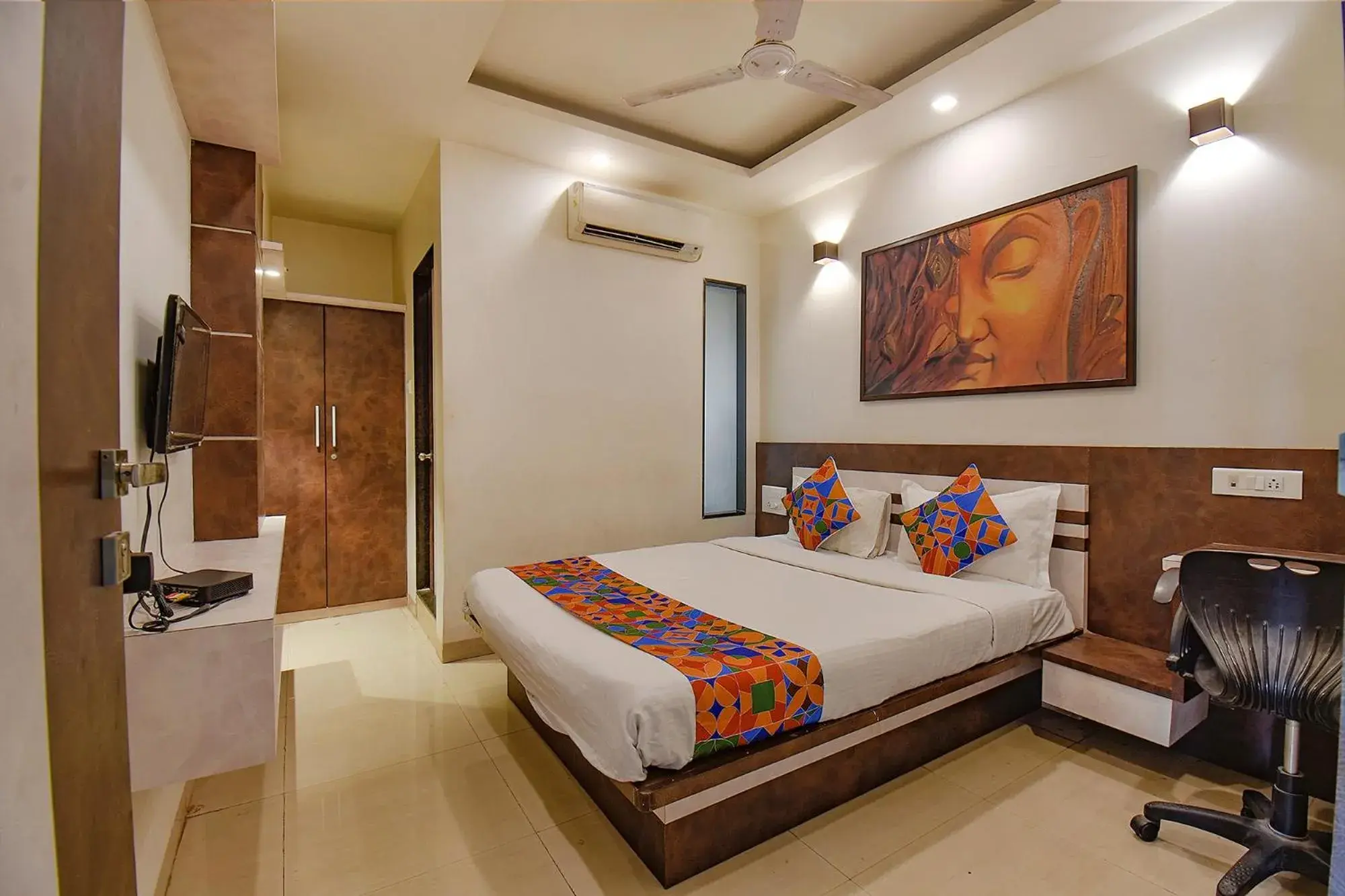 TV and multimedia, Bed in FabHotel Royce Studio Apartments - Nr Pune International Airport TV and multimedia, Bed in FabHotel Royce Studio Apartments - Nr Pune International Airport