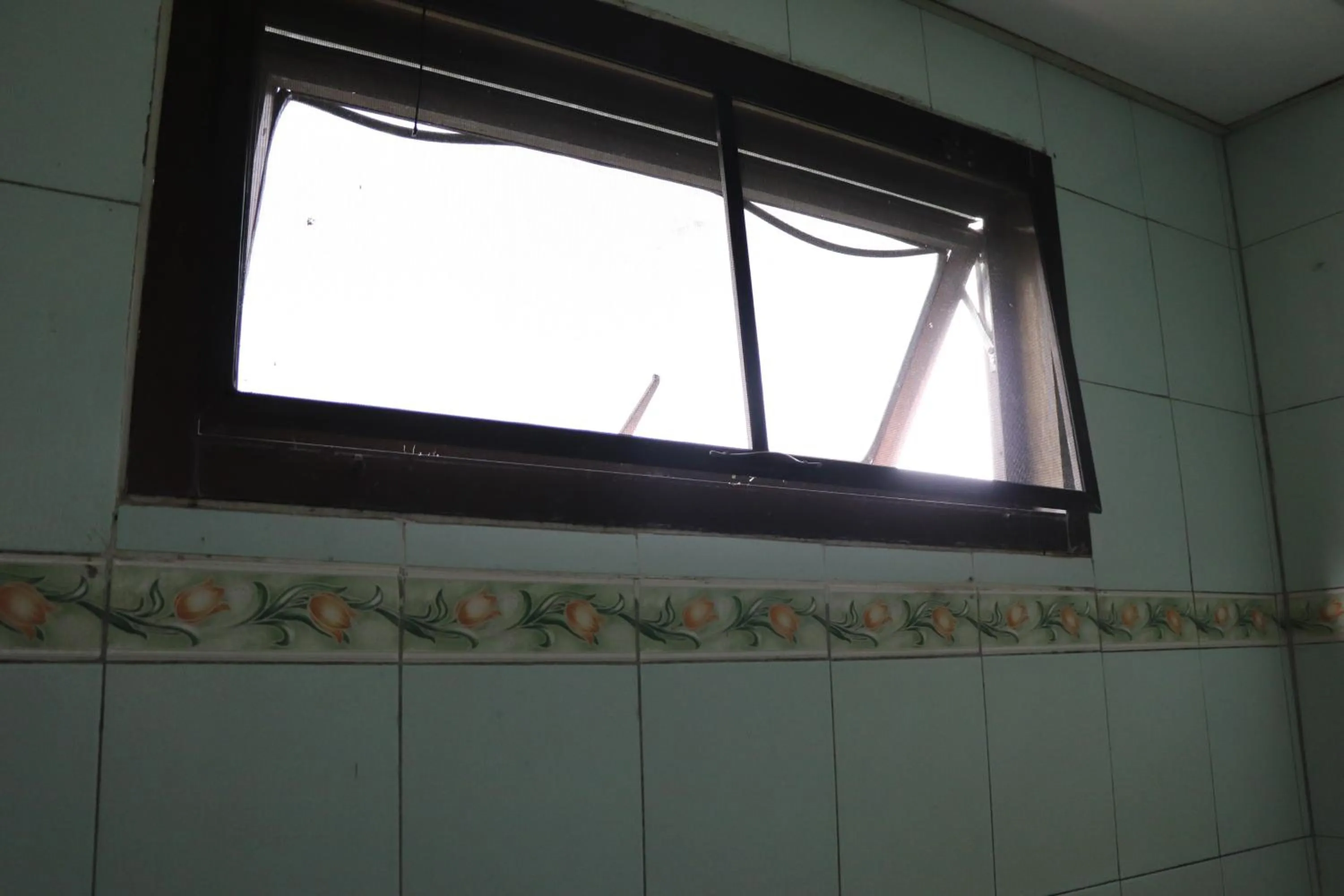 Bathroom in OYO 75408 Tipsiri Place