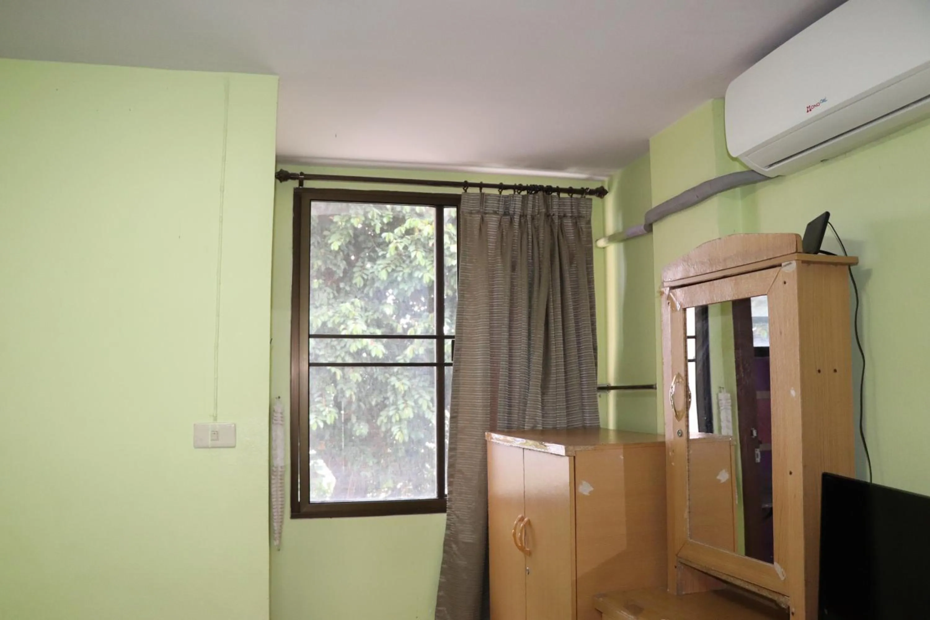 Bedroom in OYO 75408 Tipsiri Place