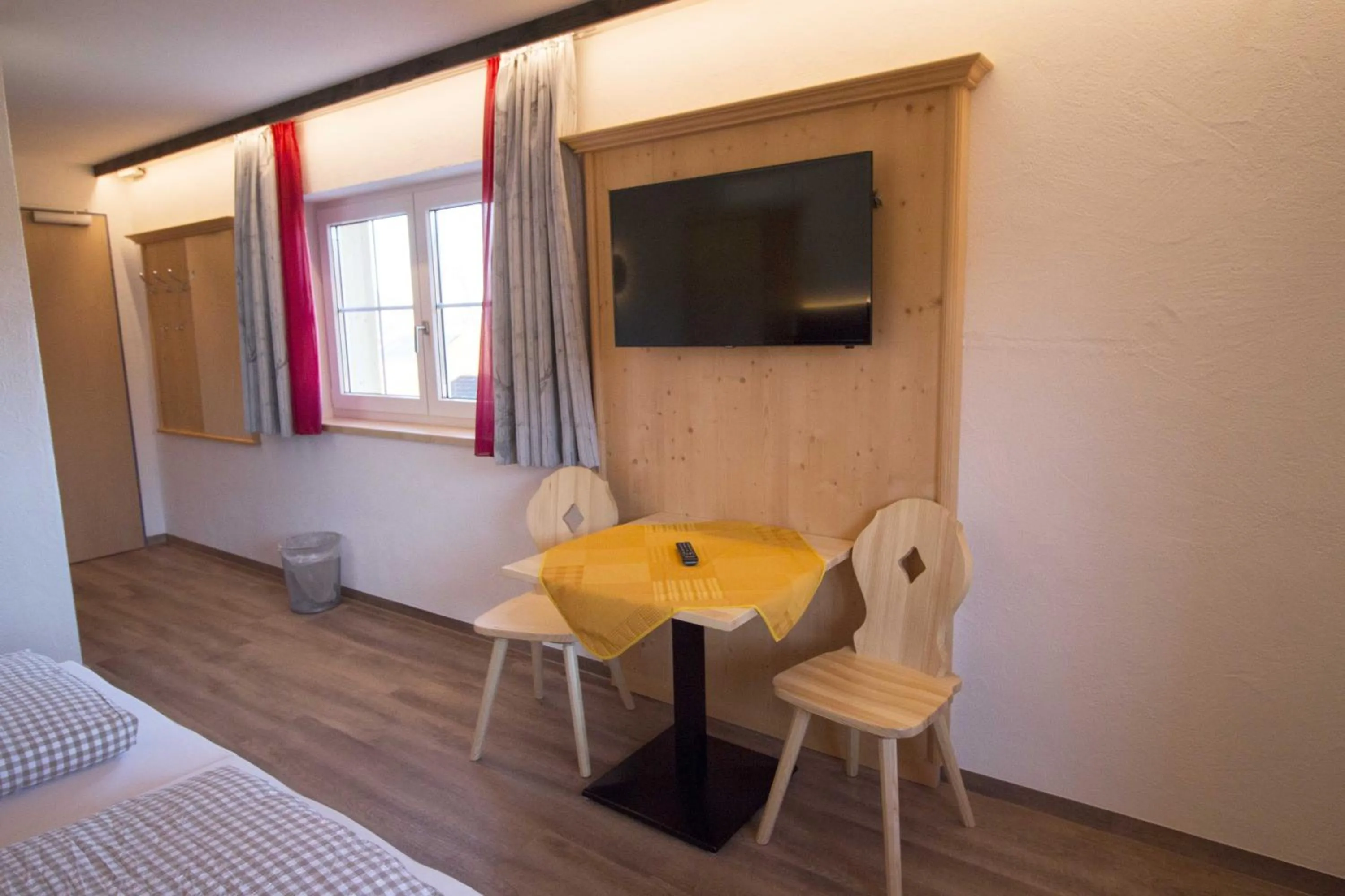 Seating area, Bed in Berggasthof Sonne Allgäu