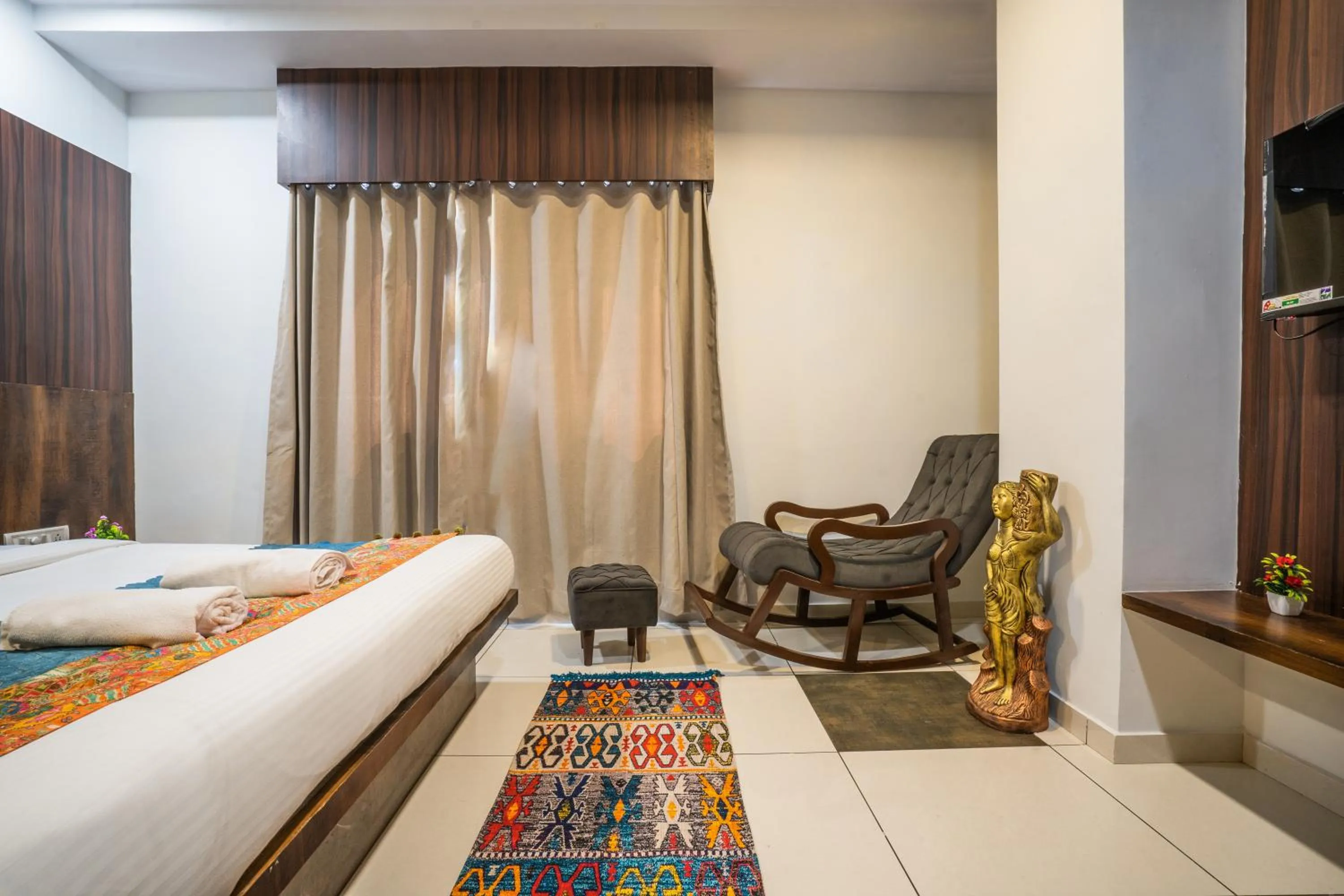 TV and multimedia, Bed in Hotel Naman