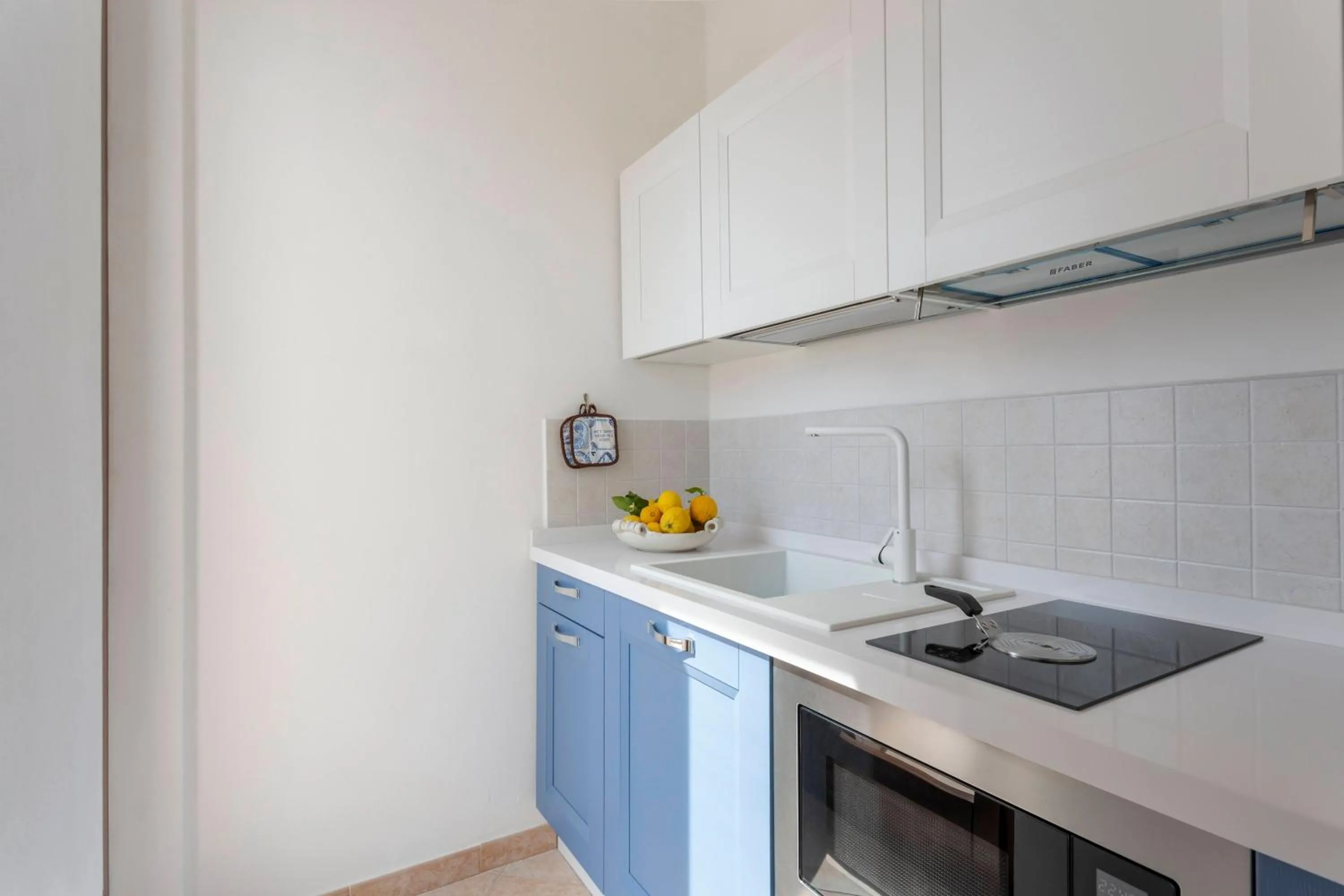 Kitchen or kitchenette in Poseidon Residence