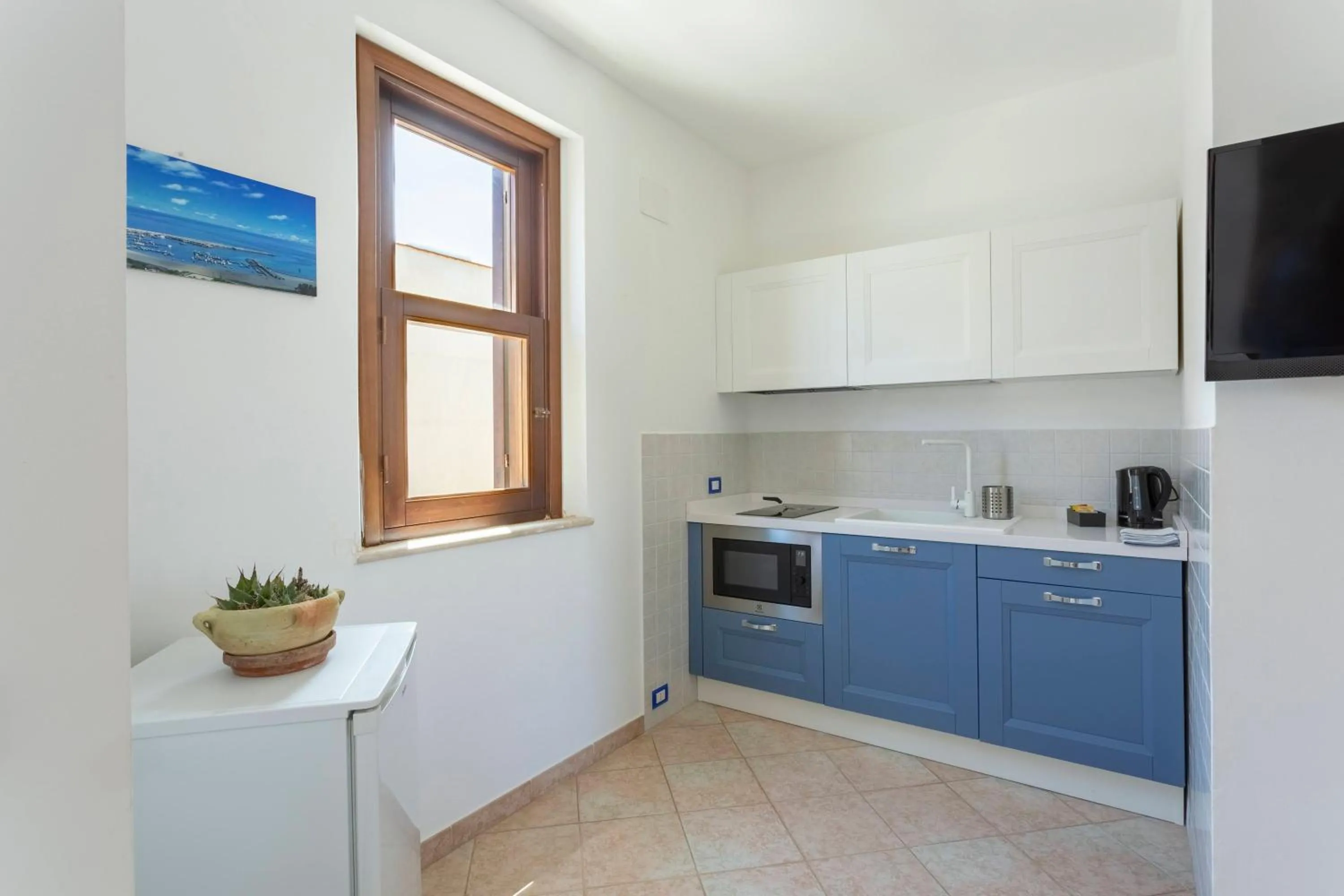 Kitchen or kitchenette in Poseidon Residence