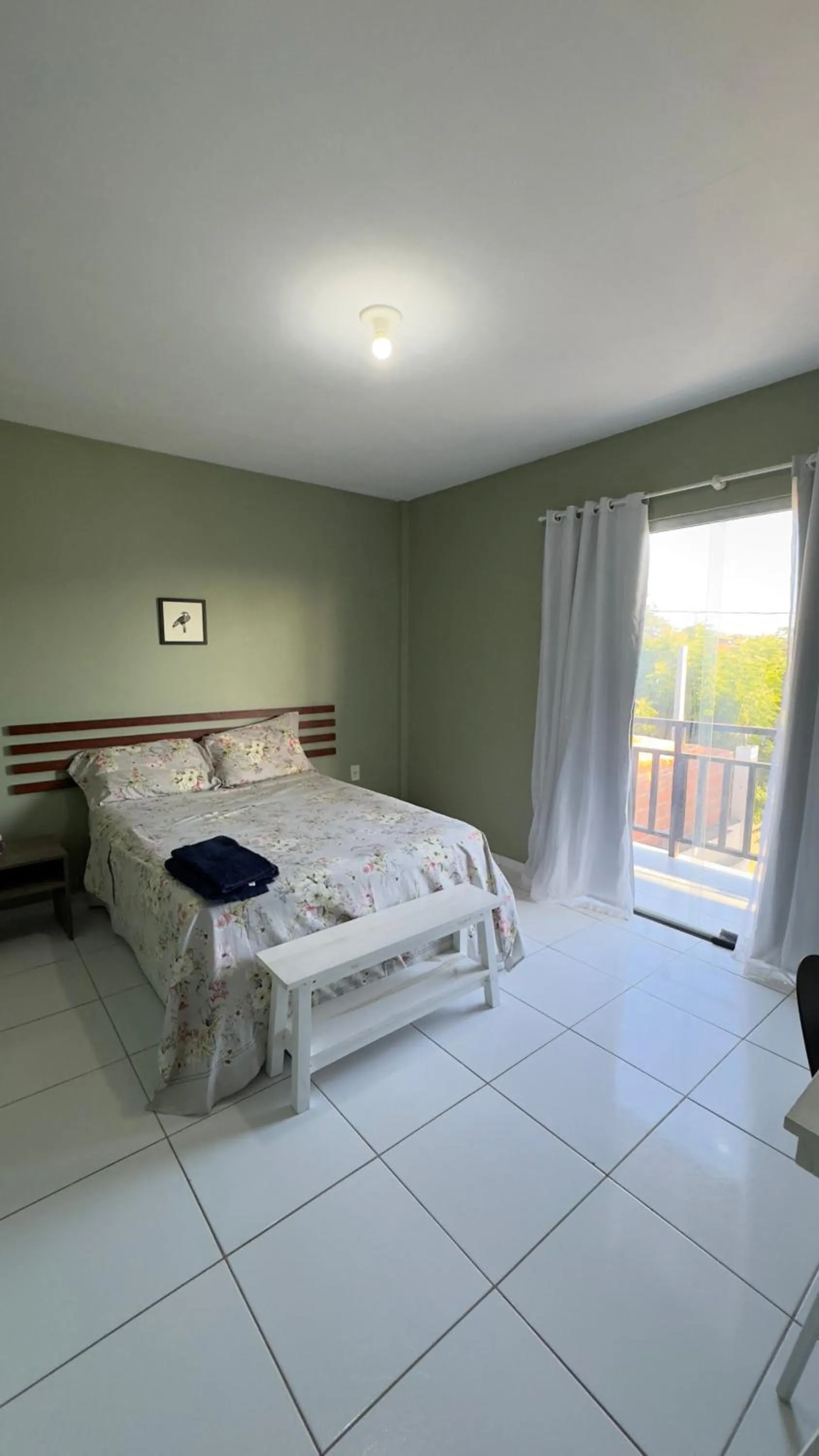 Bed in Pousada Vovó Haidê