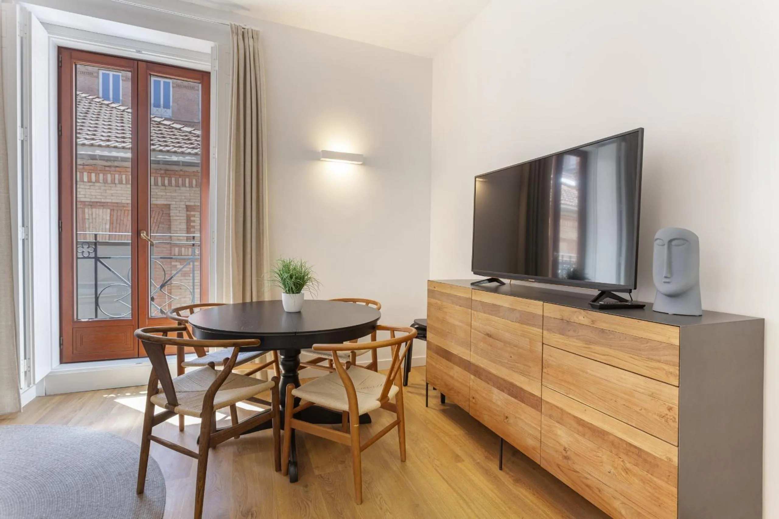 Communal lounge/ TV room in Bellas Artes en Madrid