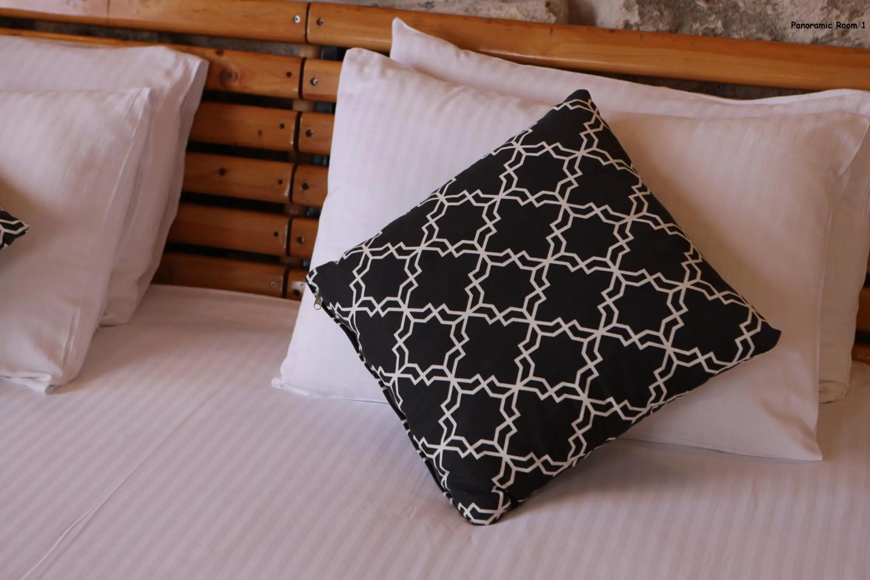 Bed in Pinhan Cave Suites