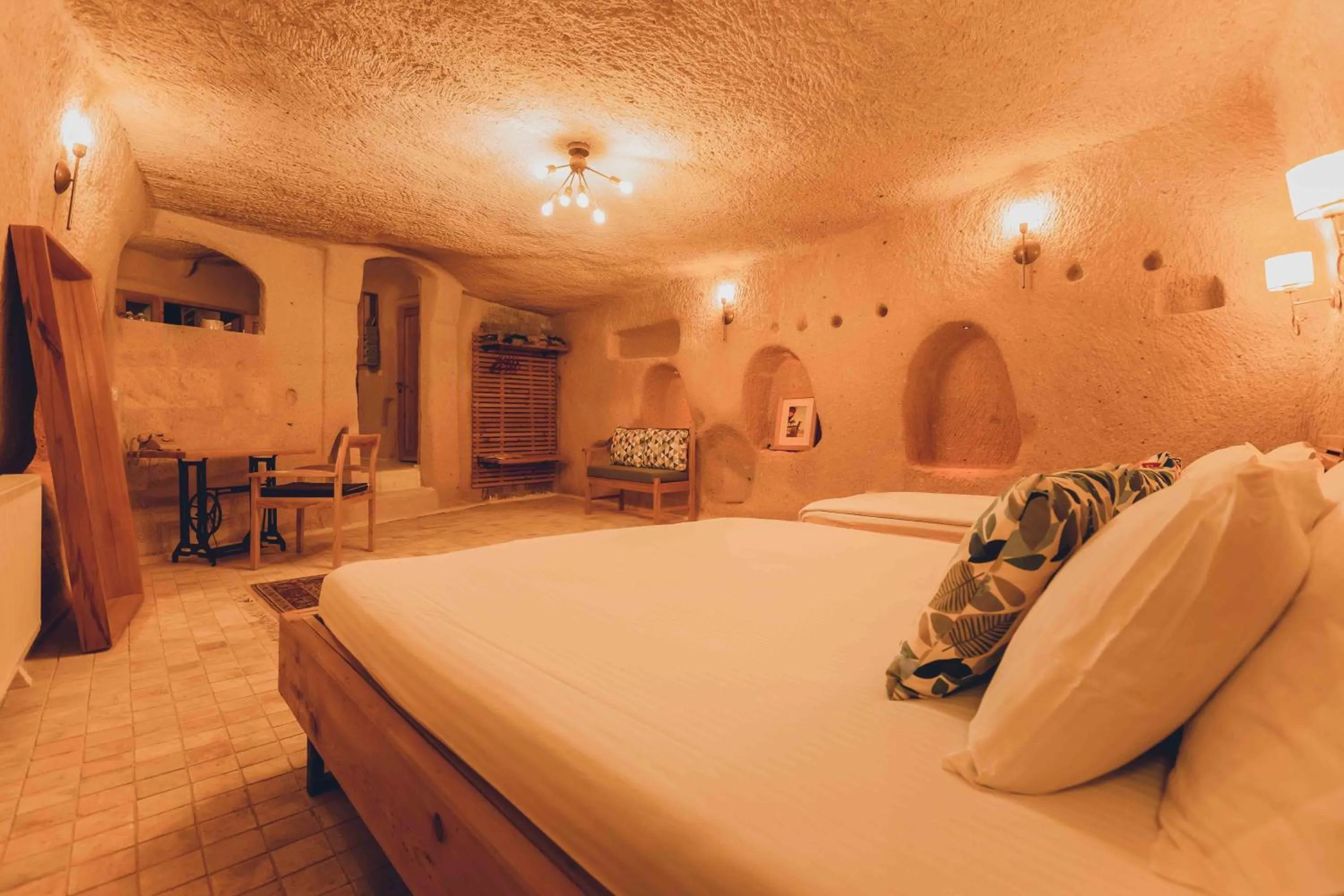 Bed in Pinhan Cave Suites