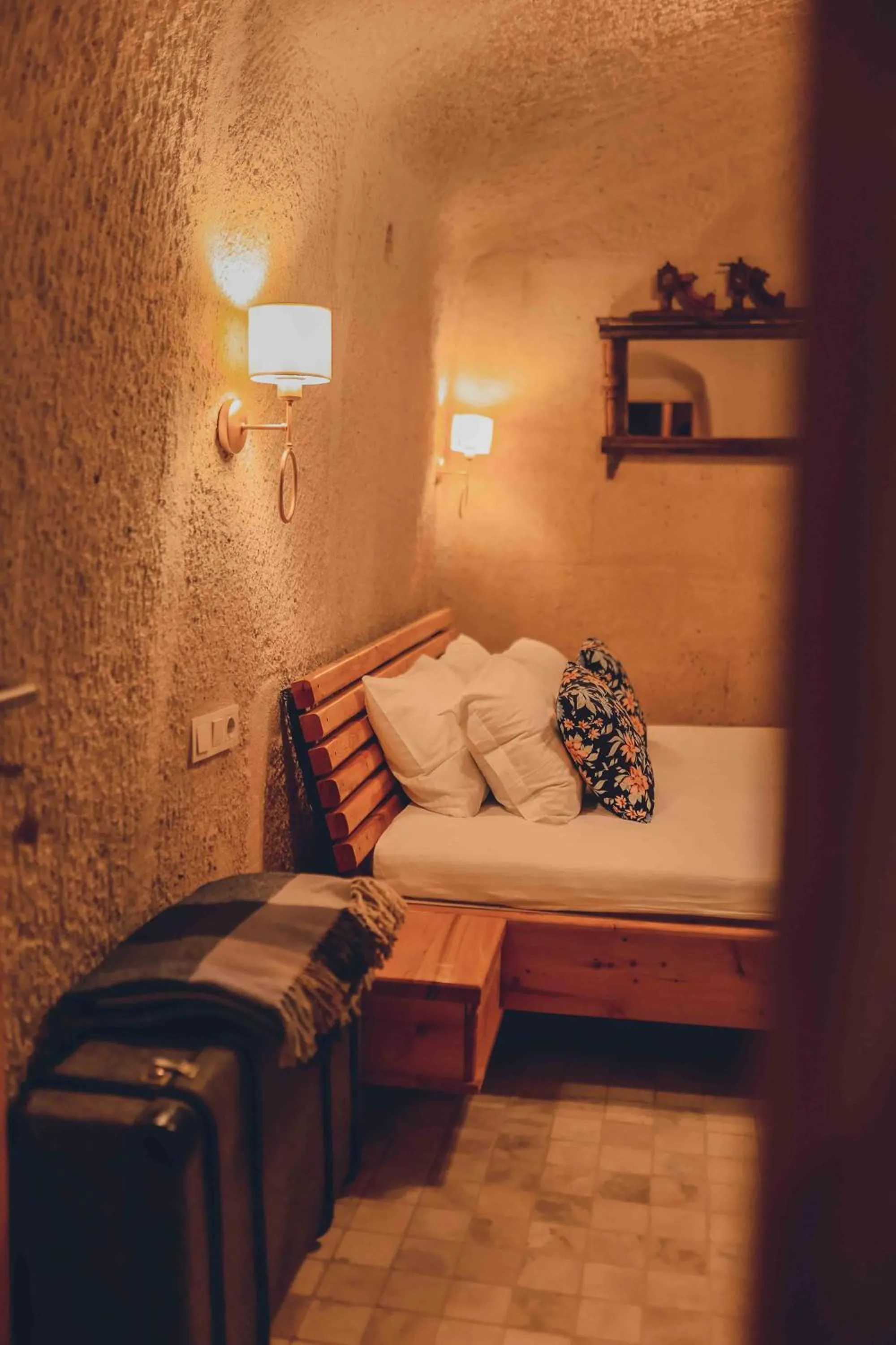 Bed in Pinhan Cave Suites