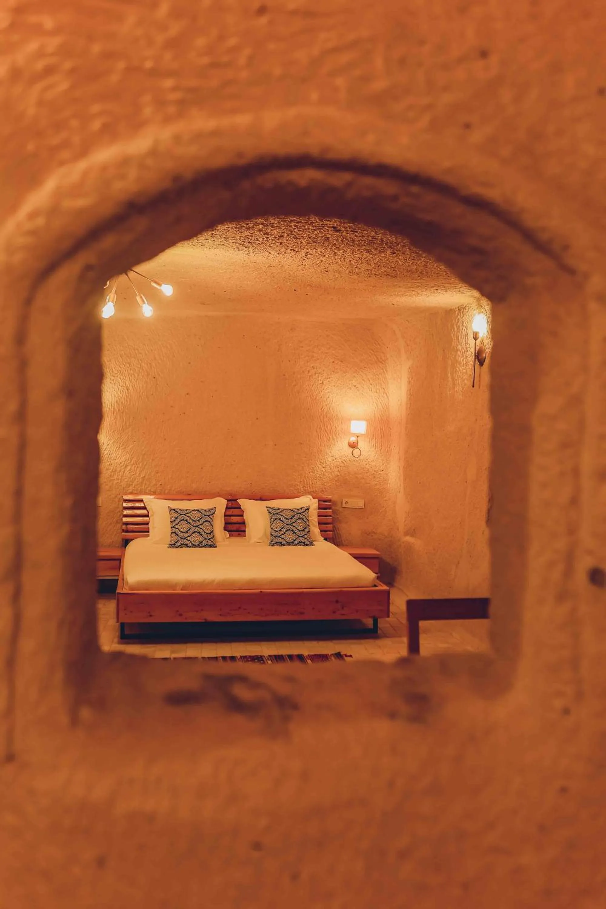 Bed in Pinhan Cave Suites