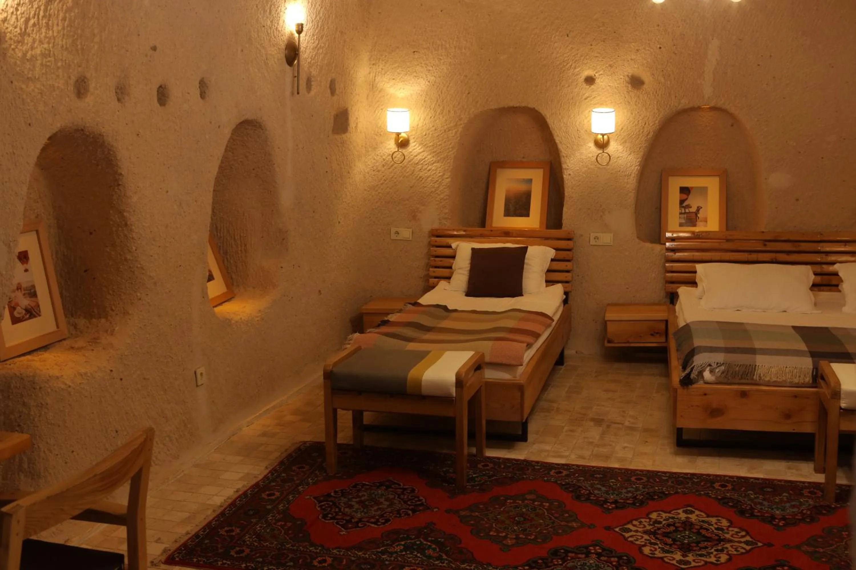Bed in Pinhan Cave Suites