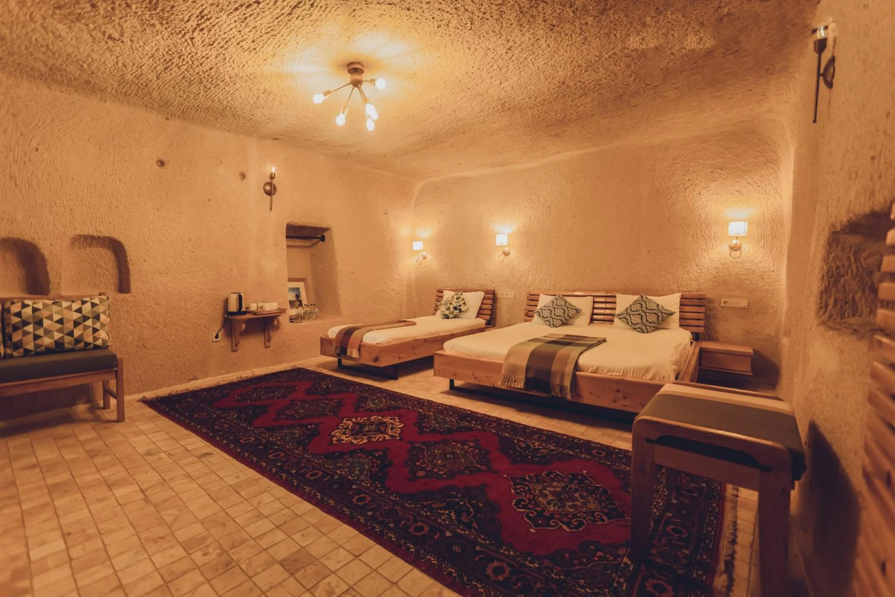 Bed in Pinhan Cave Suites