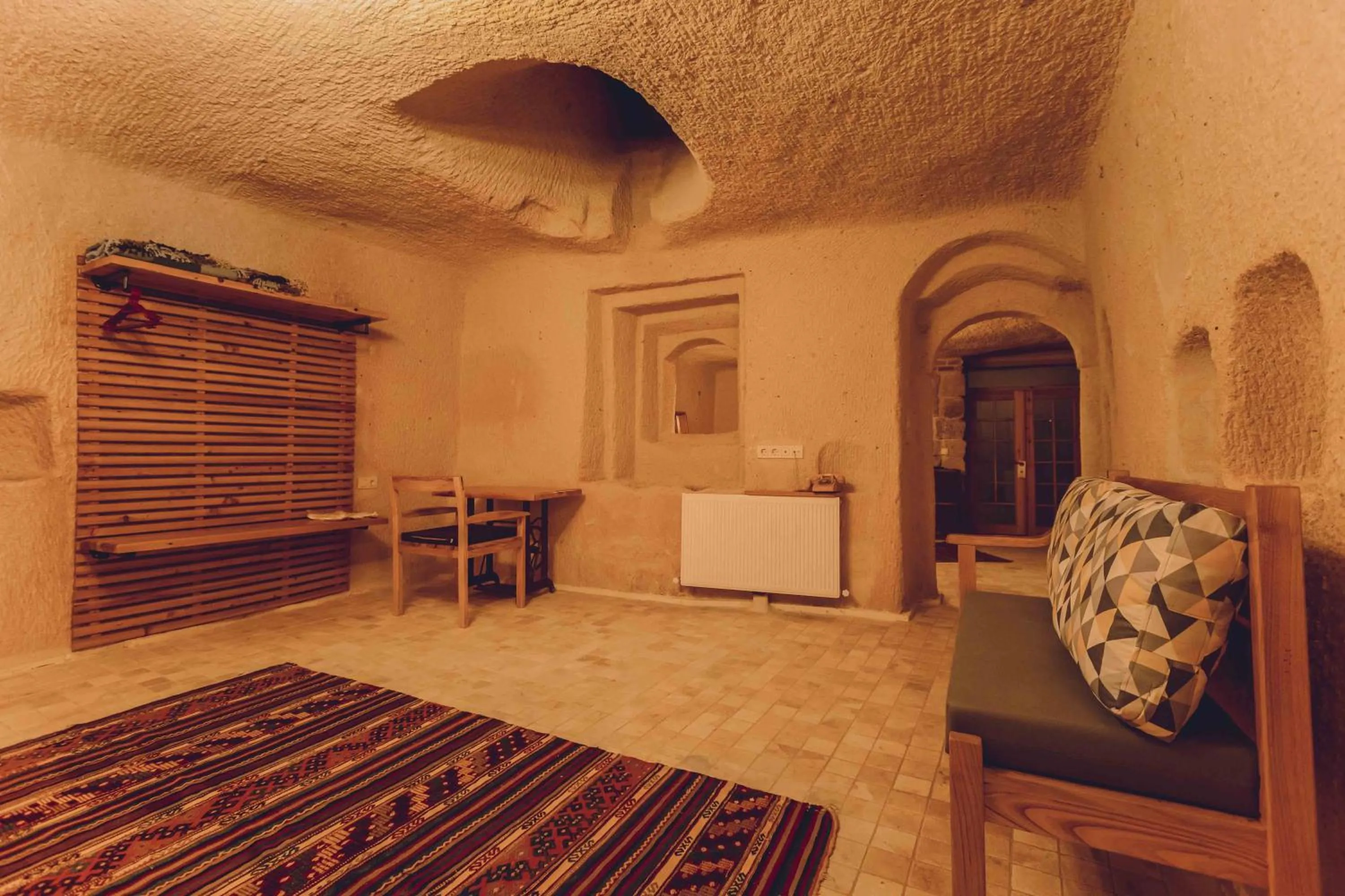 Bed in Pinhan Cave Suites