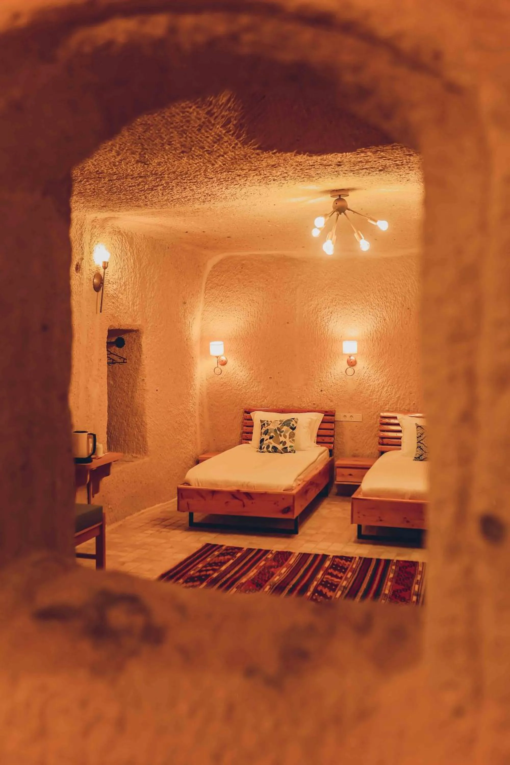 Bed in Pinhan Cave Suites