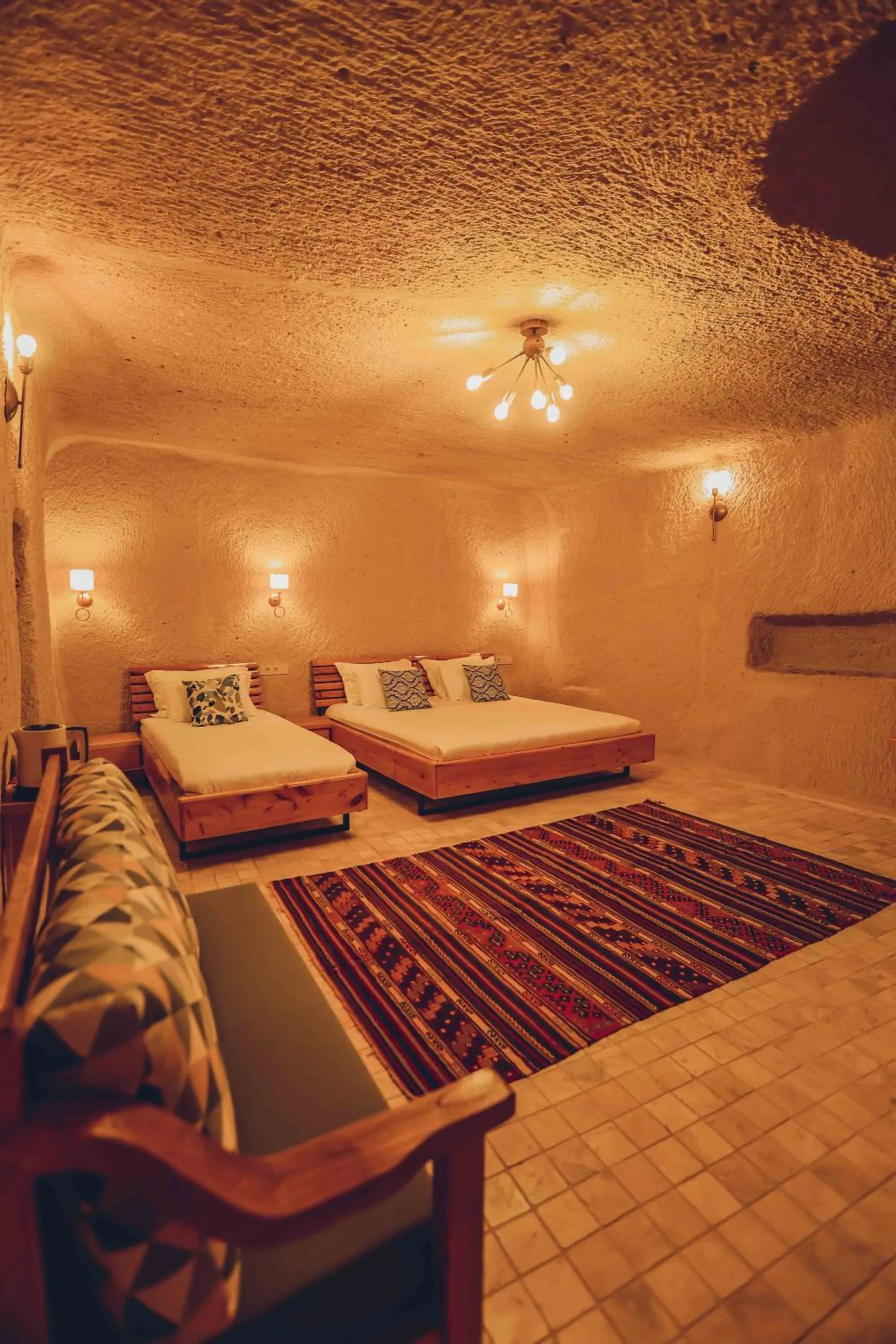 Bed in Pinhan Cave Suites