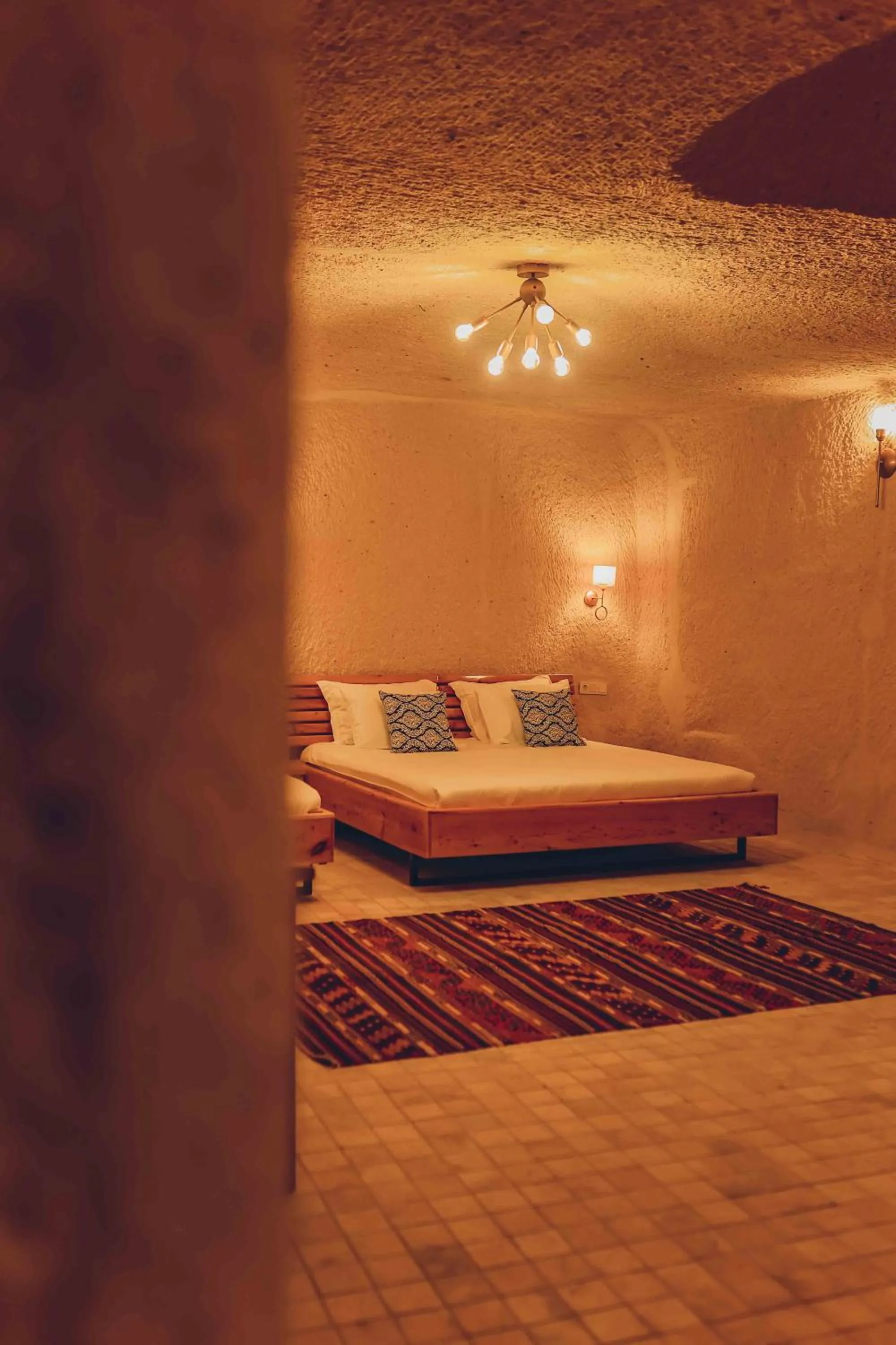 Bed in Pinhan Cave Suites