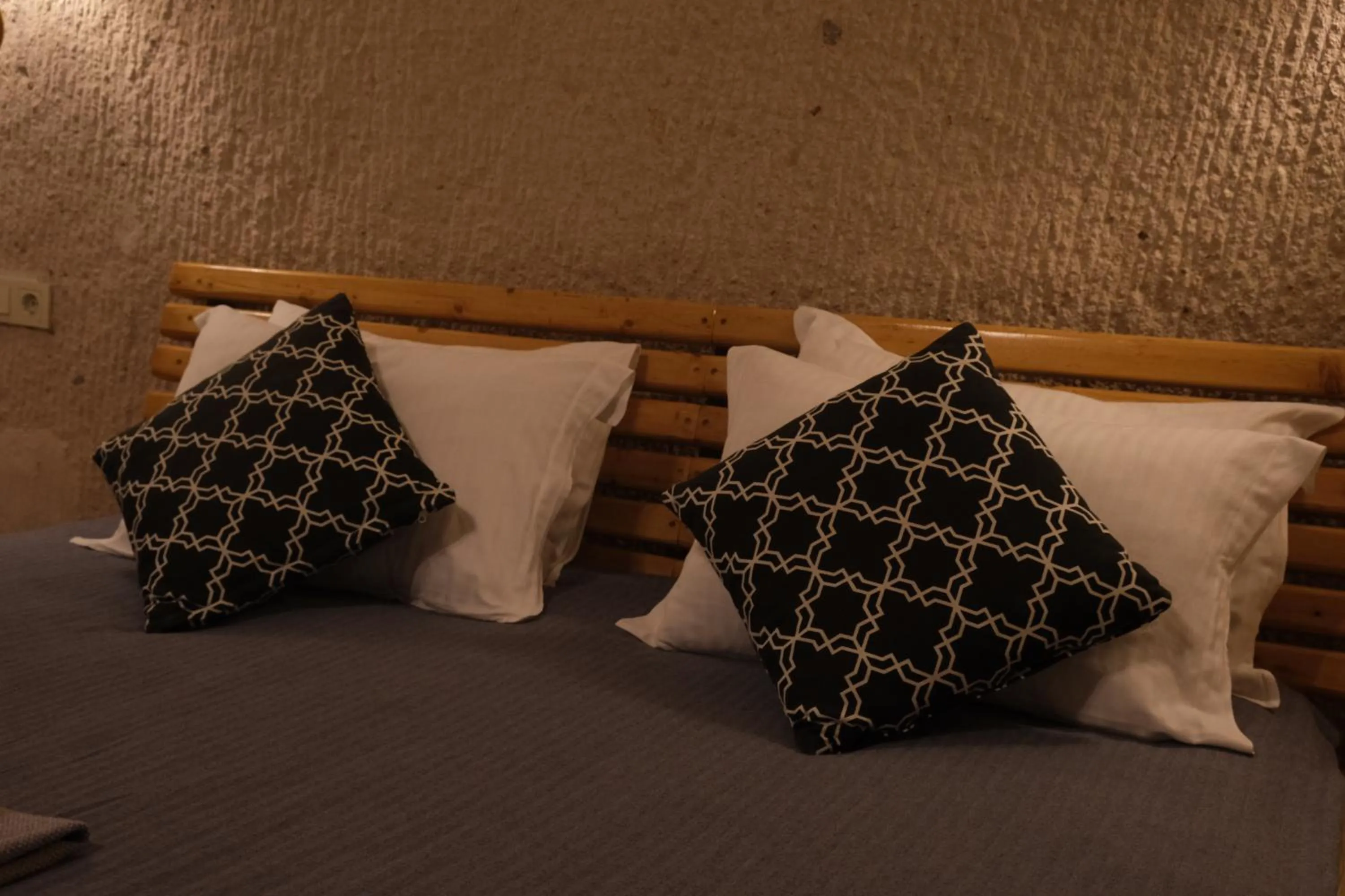 Bed in Pinhan Cave Suites