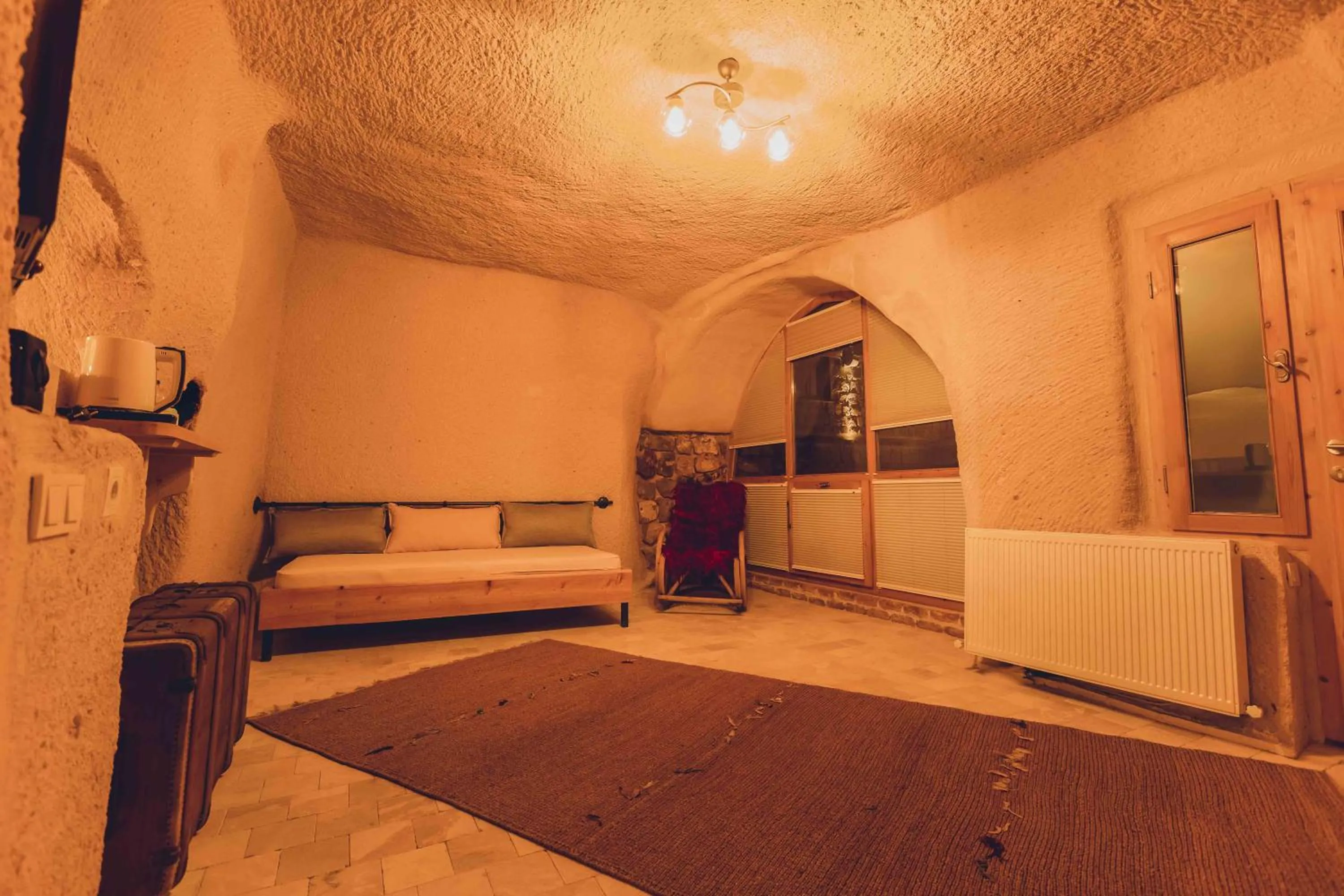 Bed in Pinhan Cave Suites