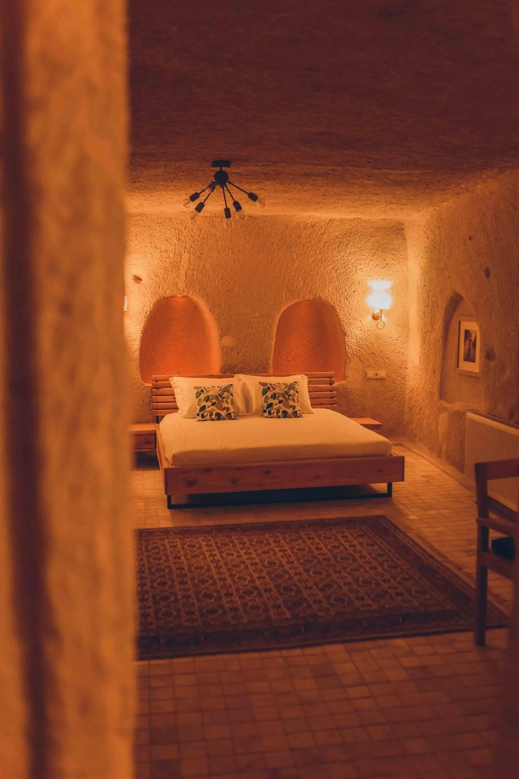 Bed in Pinhan Cave Suites