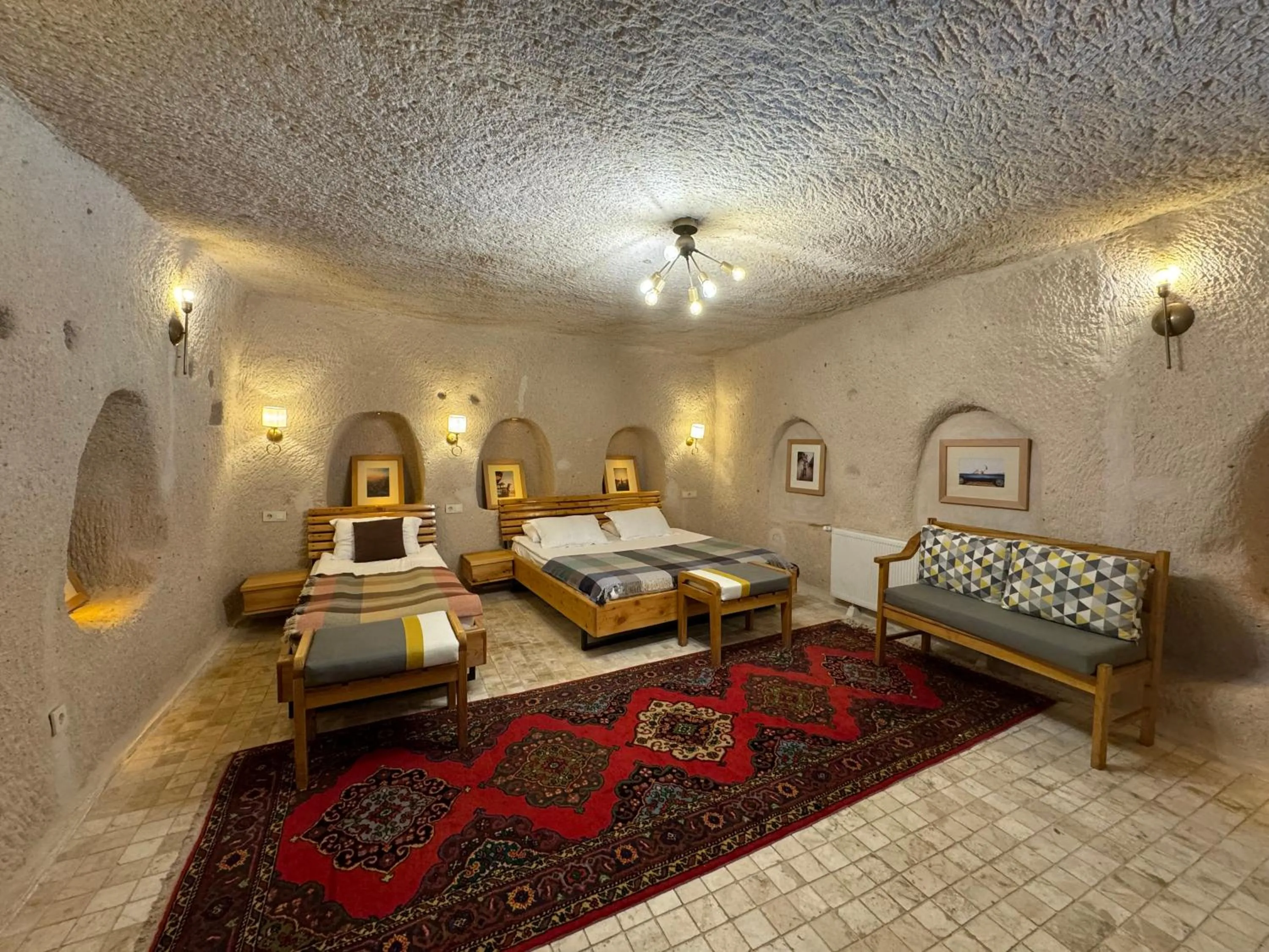 Bed in Pinhan Cave Suites