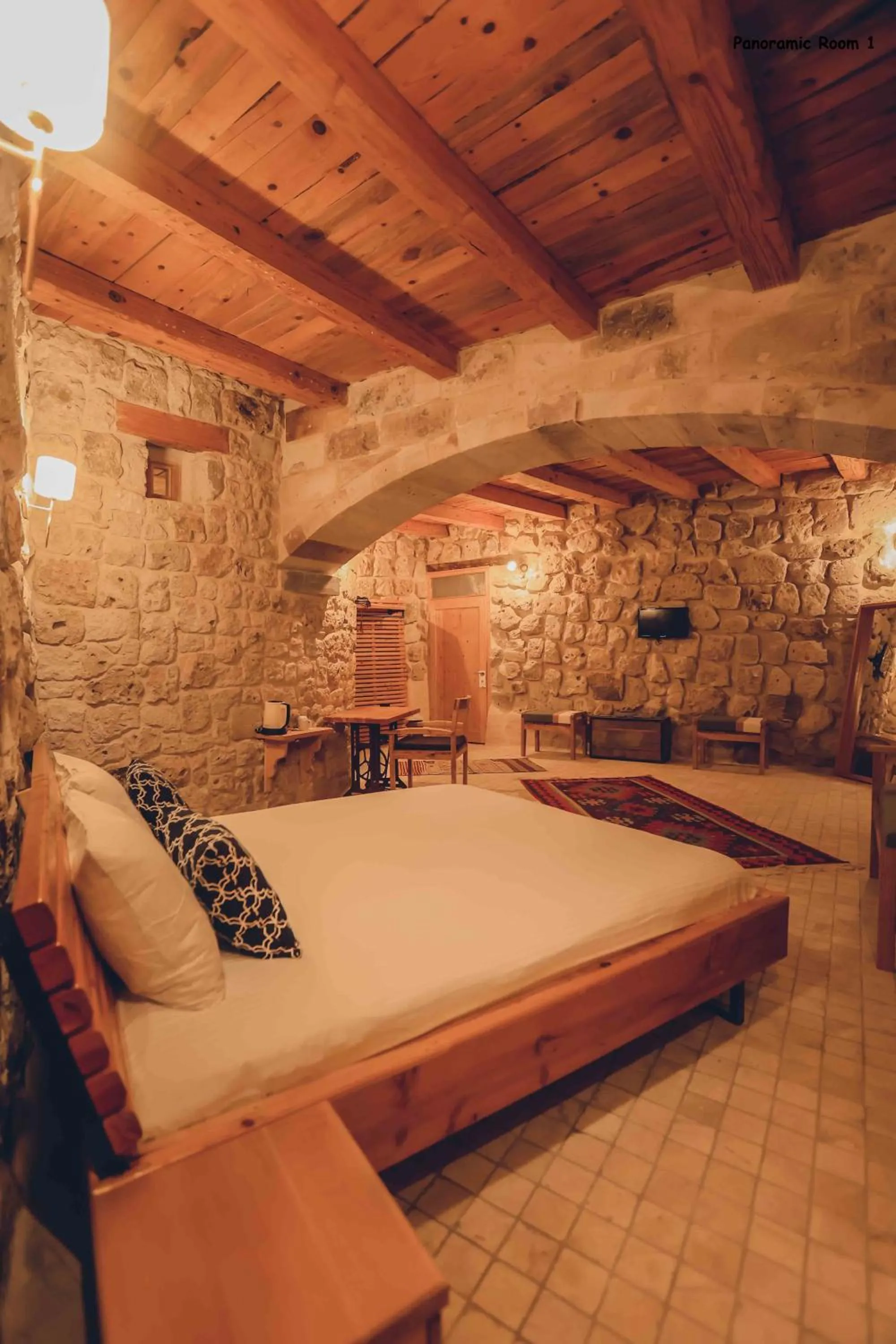 Bed in Pinhan Cave Suites