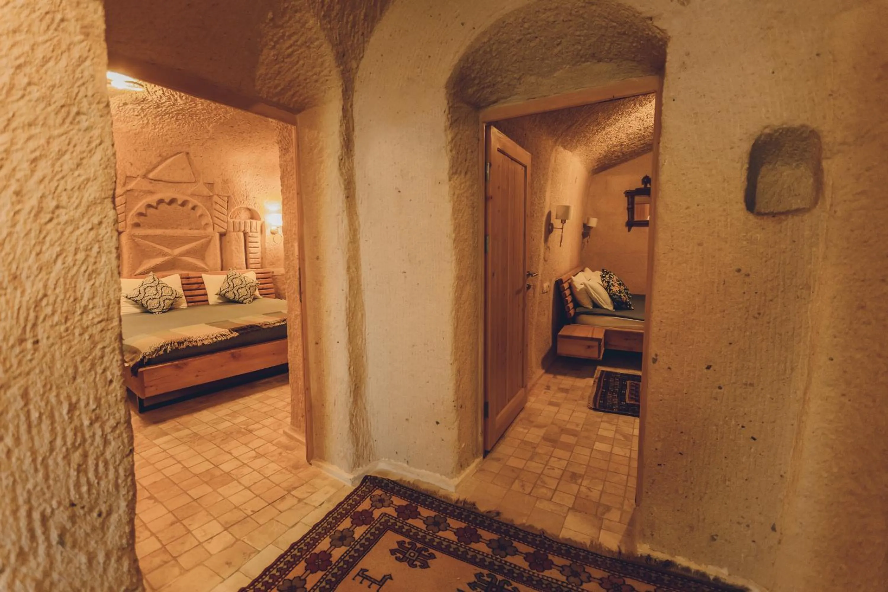Bed in Pinhan Cave Suites