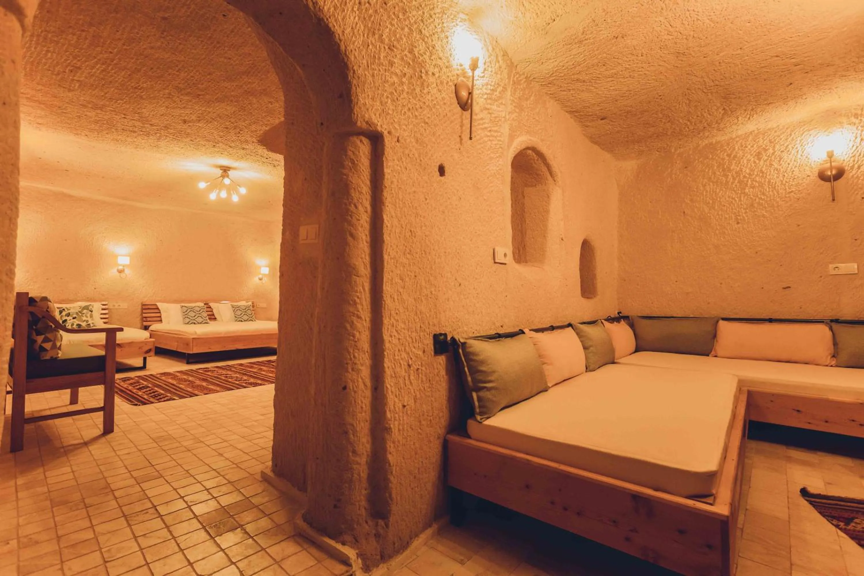 Bed in Pinhan Cave Suites
