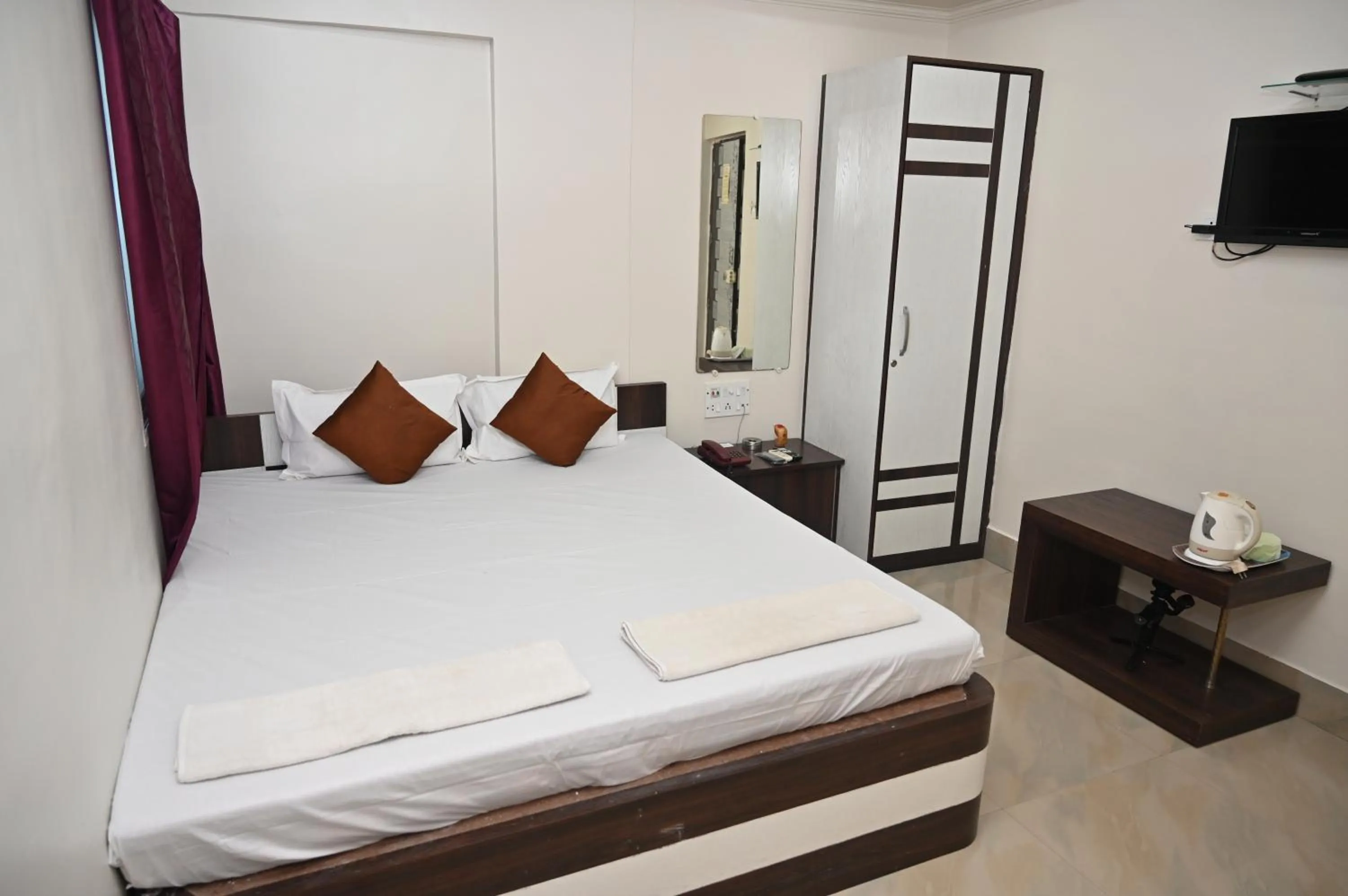 Bedroom in HOTEL GITANJALI